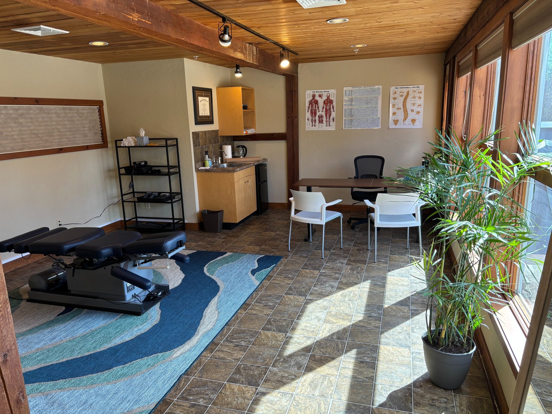 red leather padded massage bed inside building