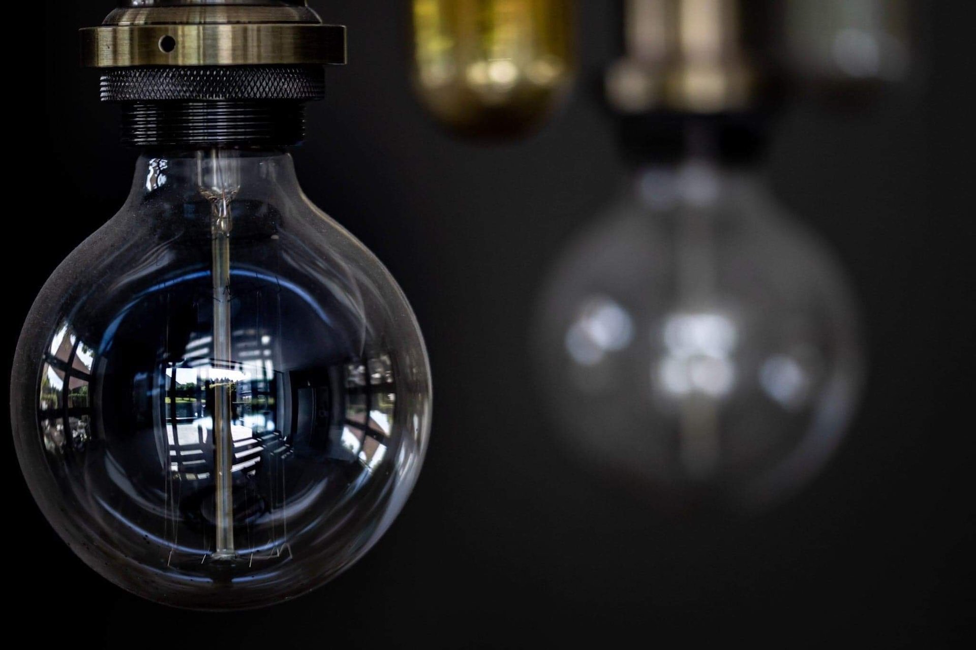 woman wearing yellow long-sleeved dress under white clouds and blue sky during daytime