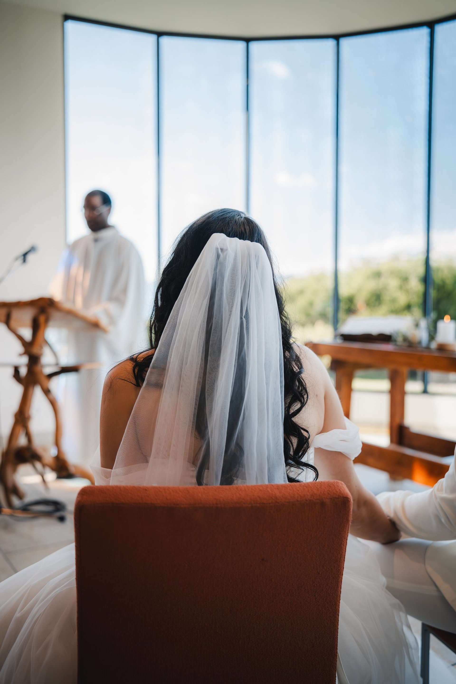 woman wearing yellow long-sleeved dress under white clouds and blue sky during daytime