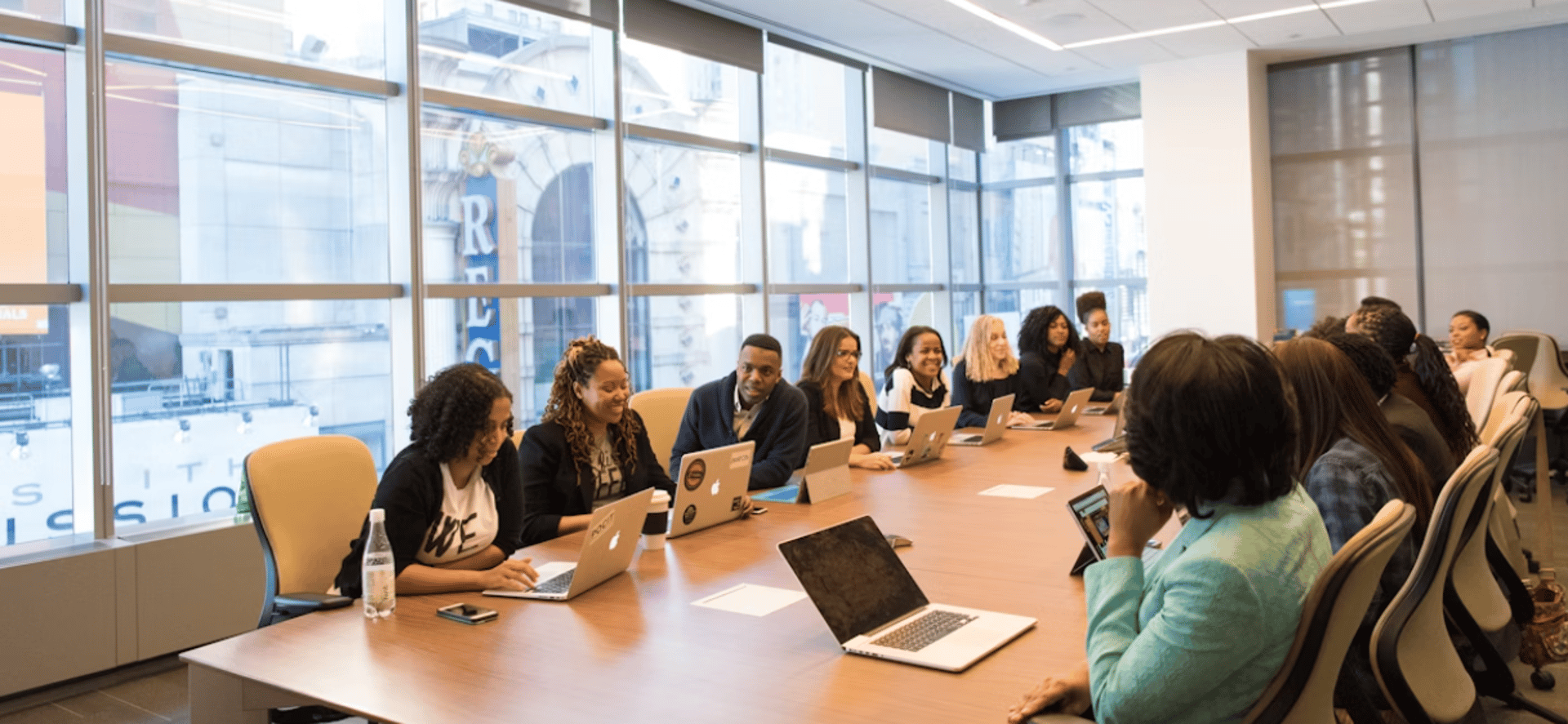 macbook pro displaying group of people