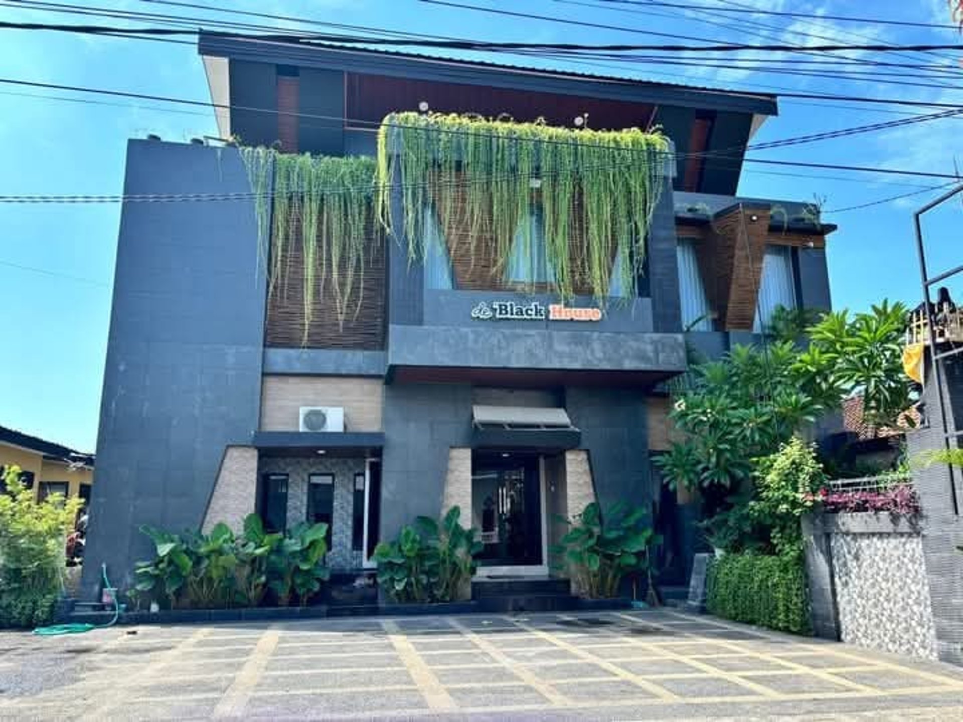 black and brown leather padded tub sofa