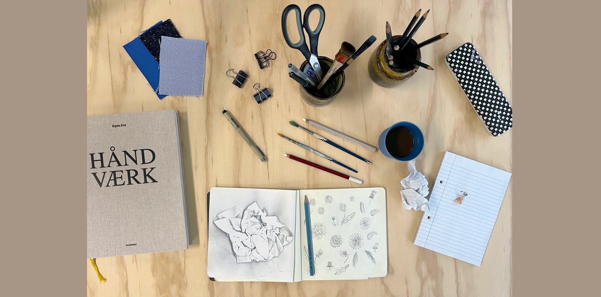 a close up of a black and brown abstract painting