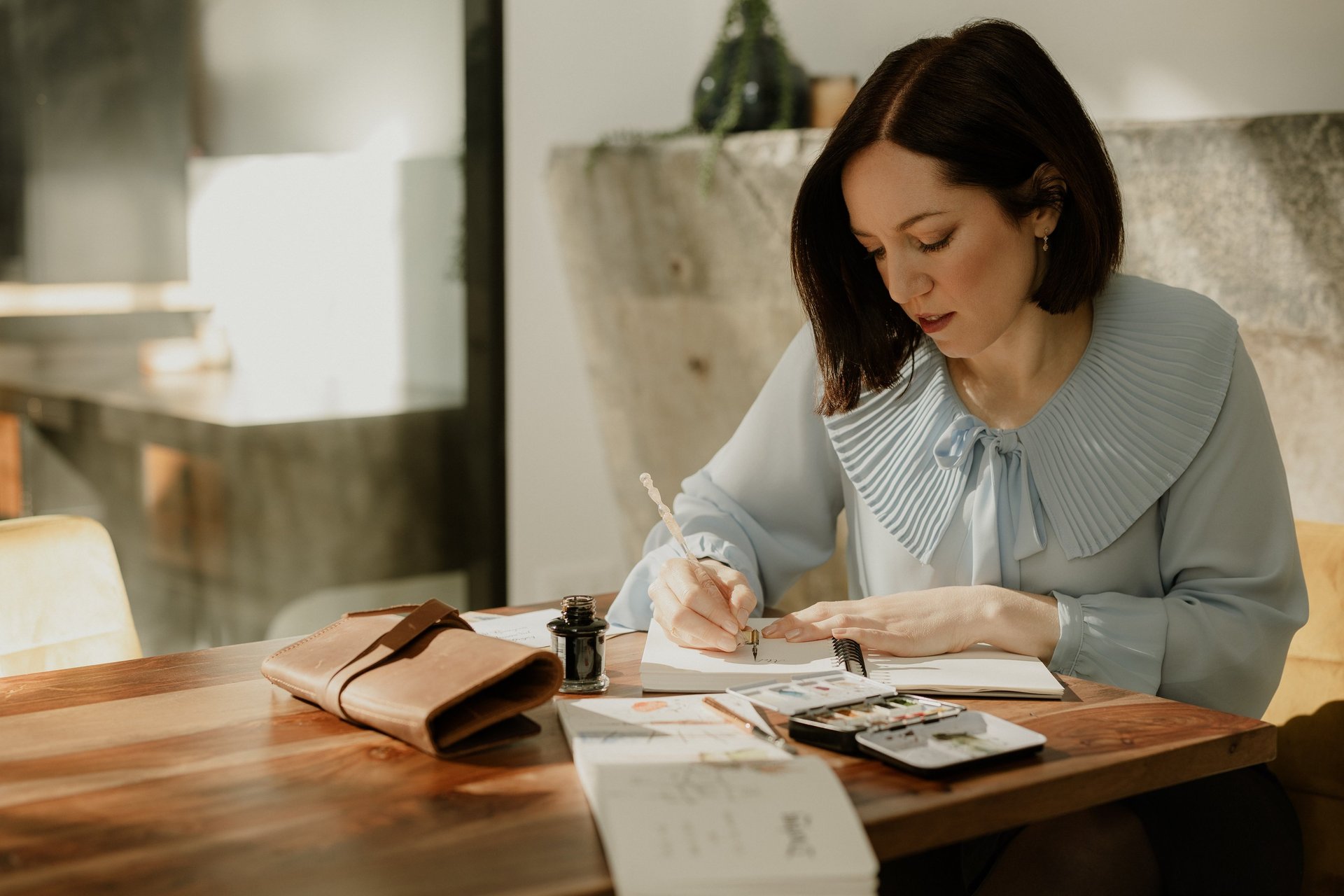 an abstract photo of a curved building with a blue sky in the background