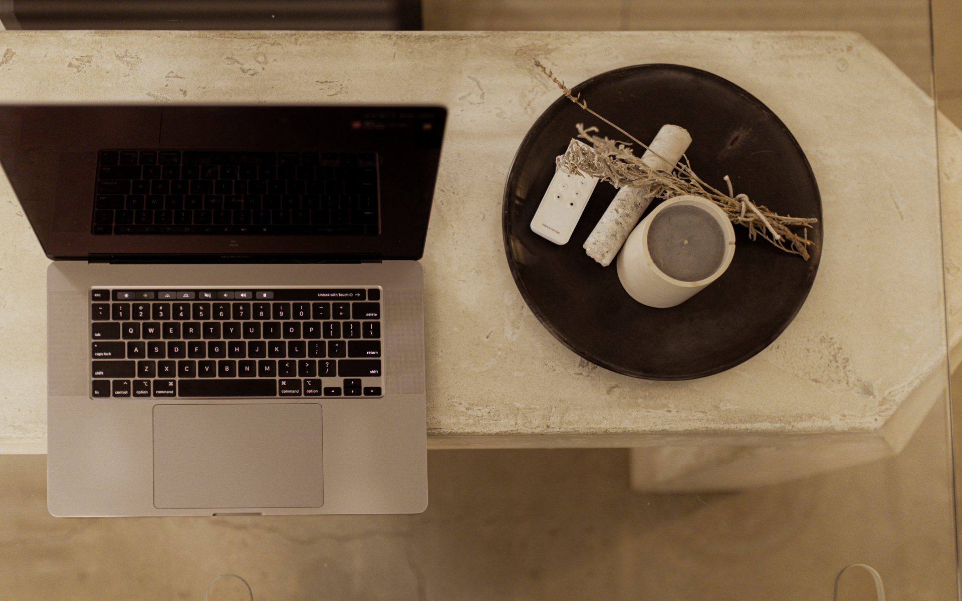 a group of people sitting on the side of a river