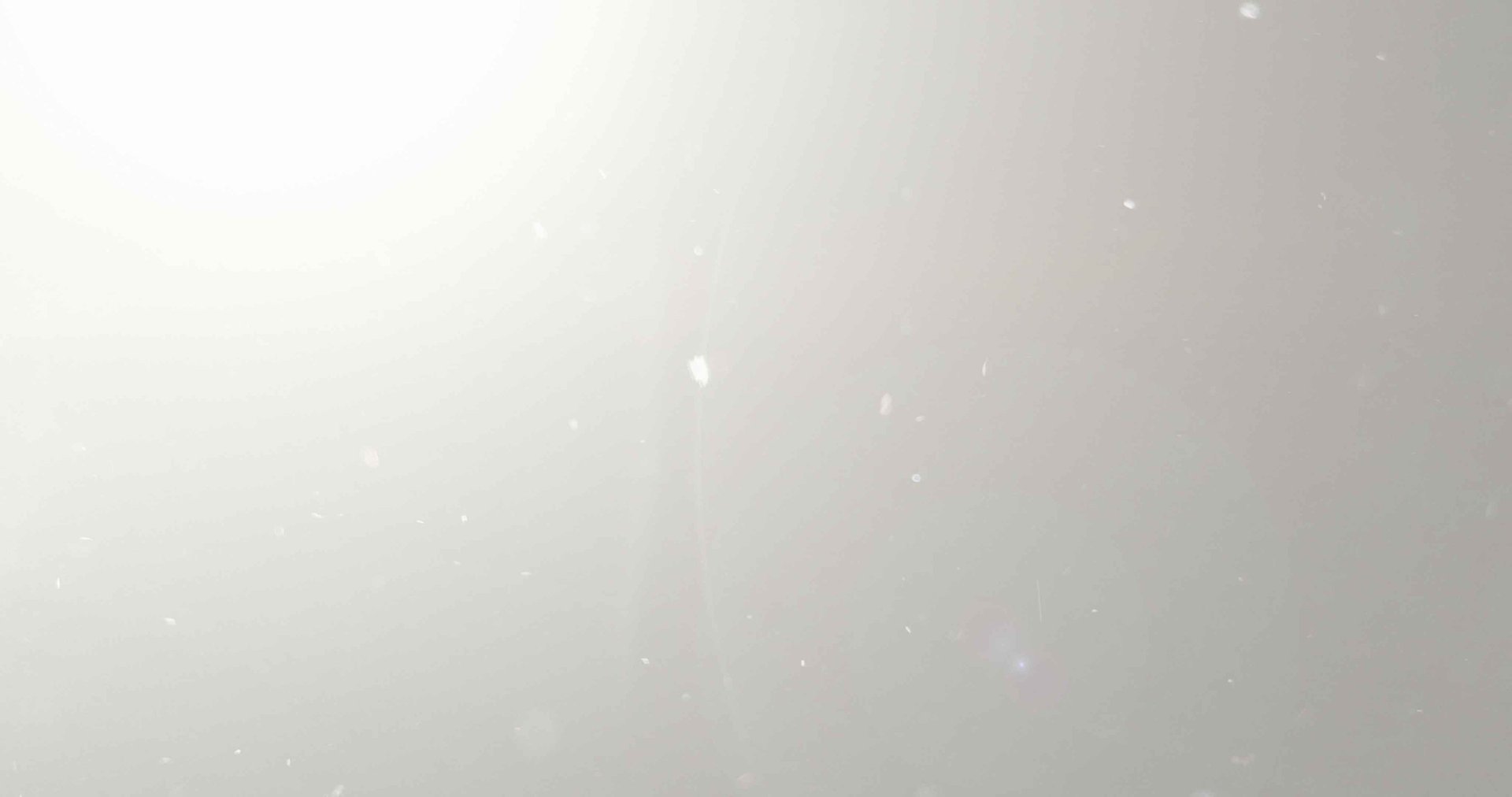 a black and white photo of a white wall