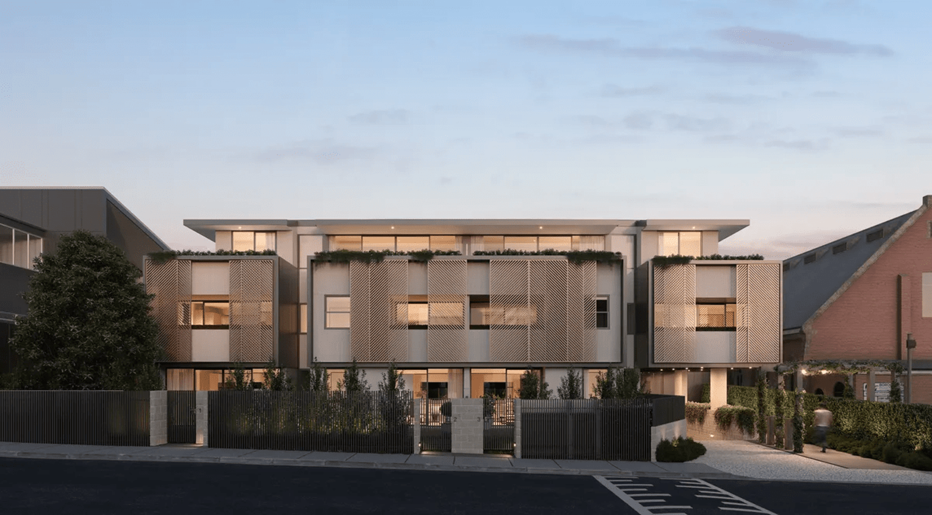 an abstract photo of a curved building with a blue sky in the background