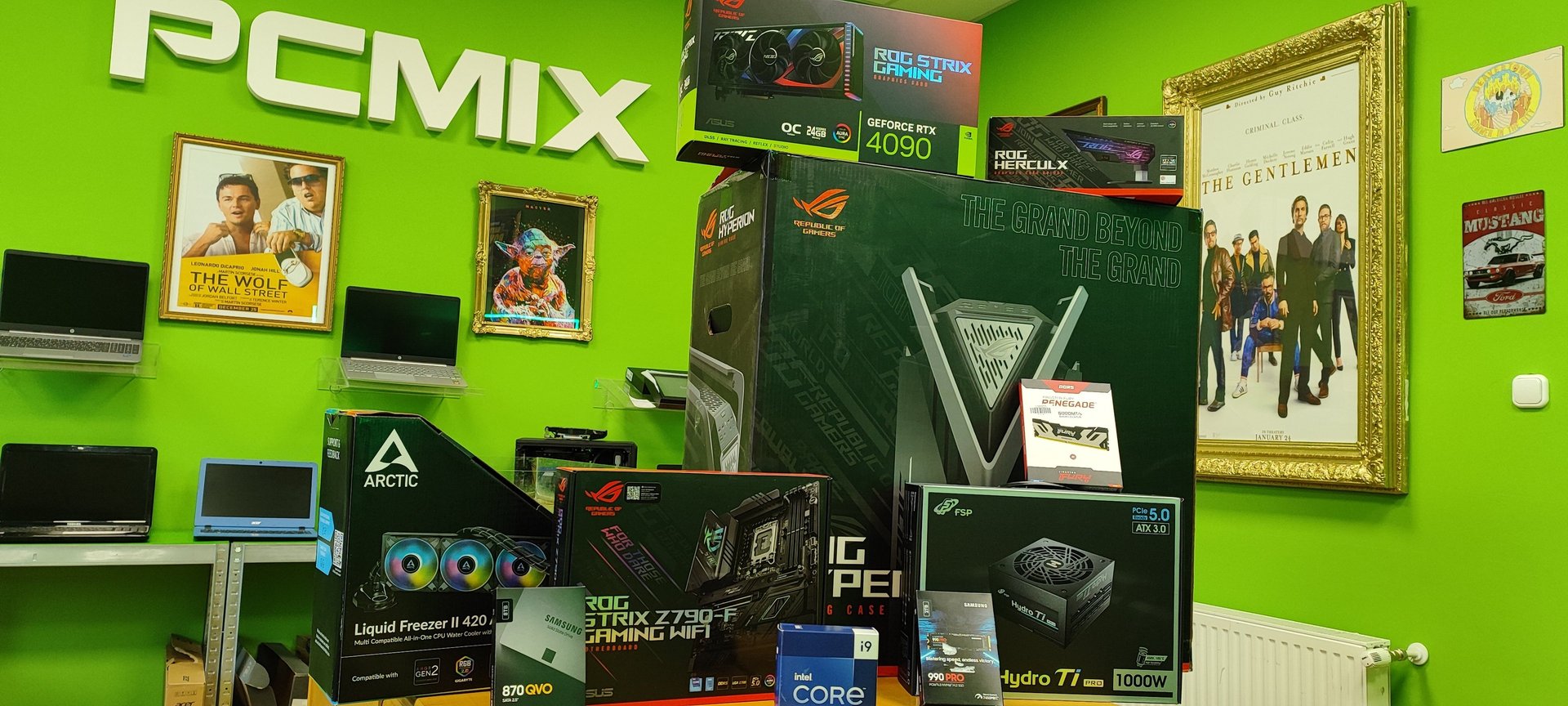 two woman sitting near table using Samsung laptop
