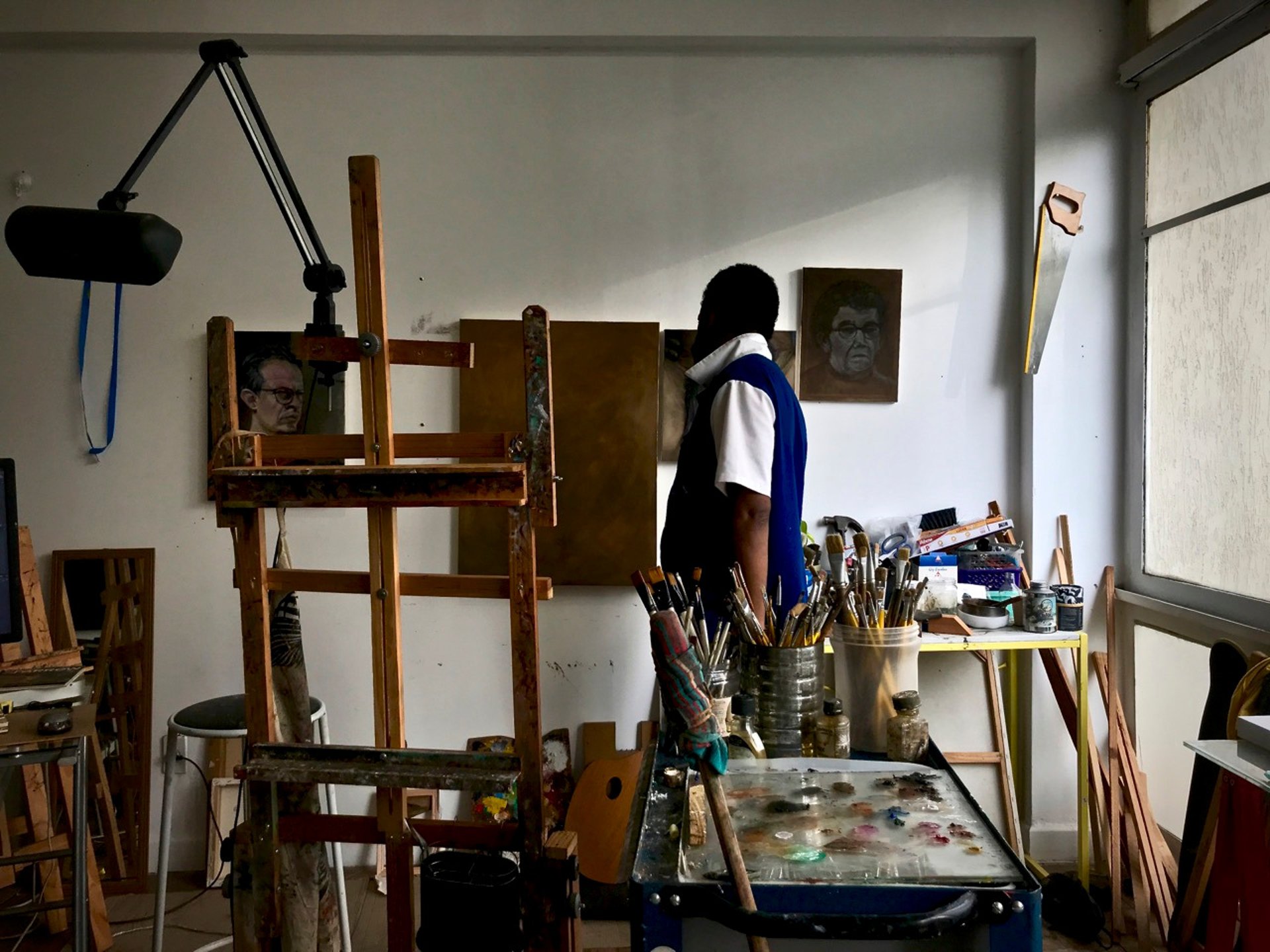an abstract photo of a curved building with a blue sky in the background