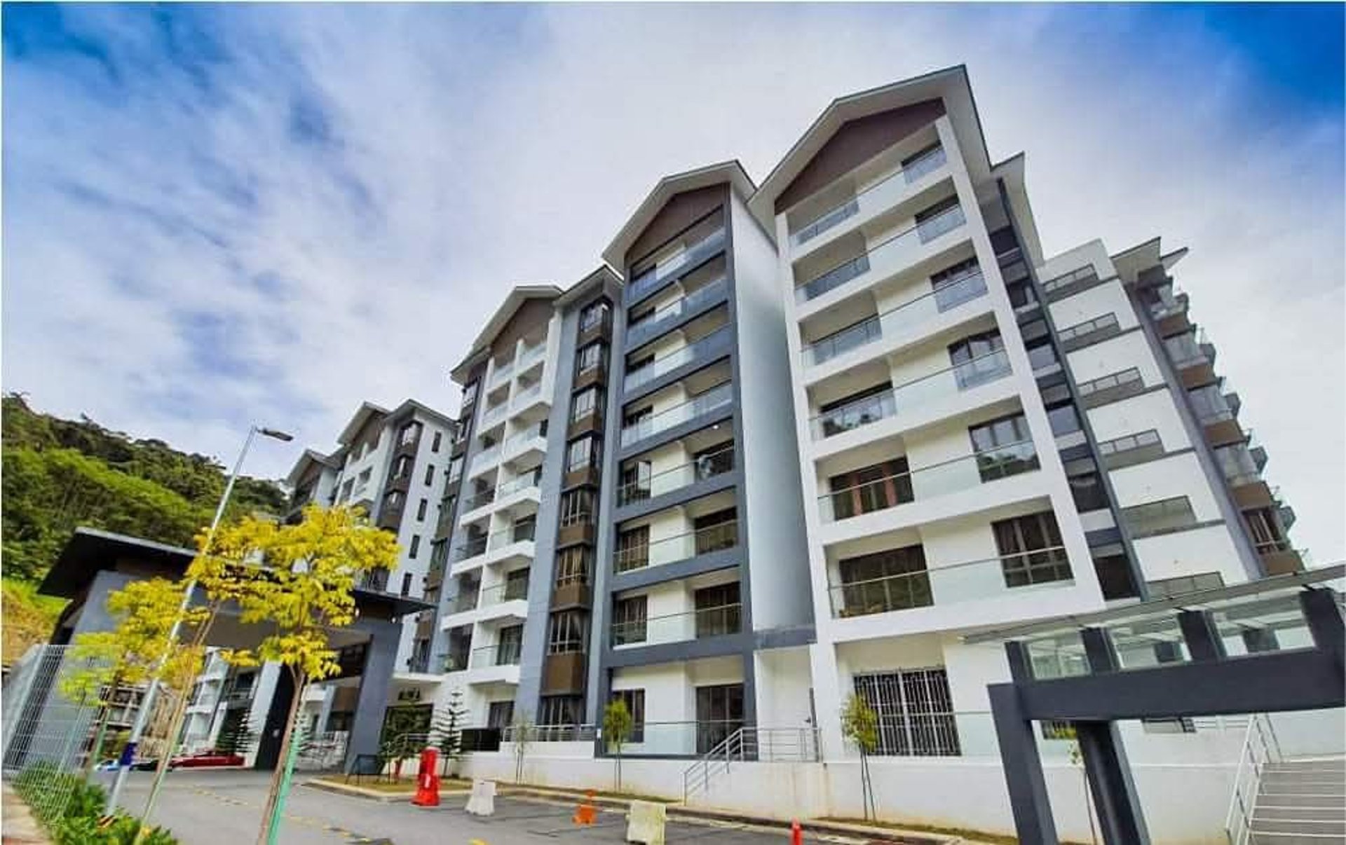 an abstract photo of a curved building with a blue sky in the background