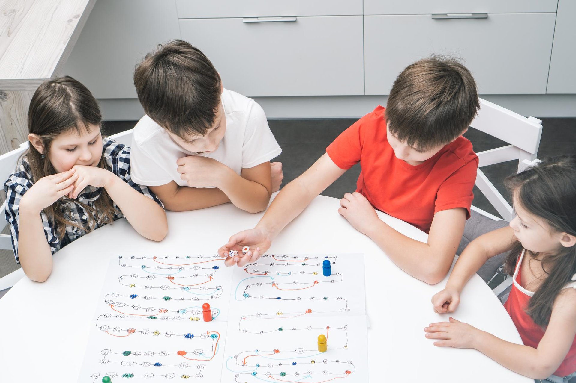 a group of children playing with toys on the floor