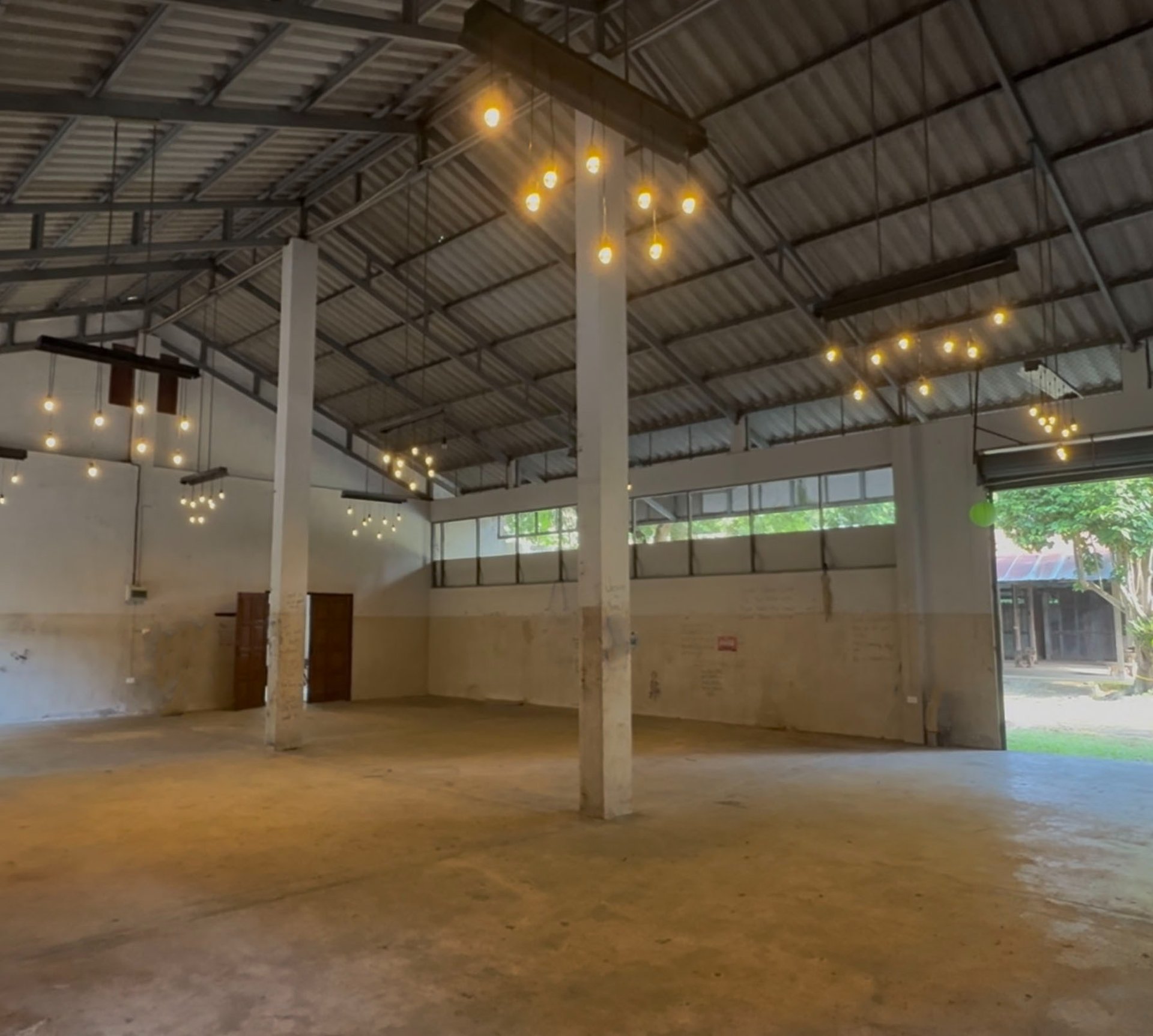 an abstract photo of a curved building with a blue sky in the background