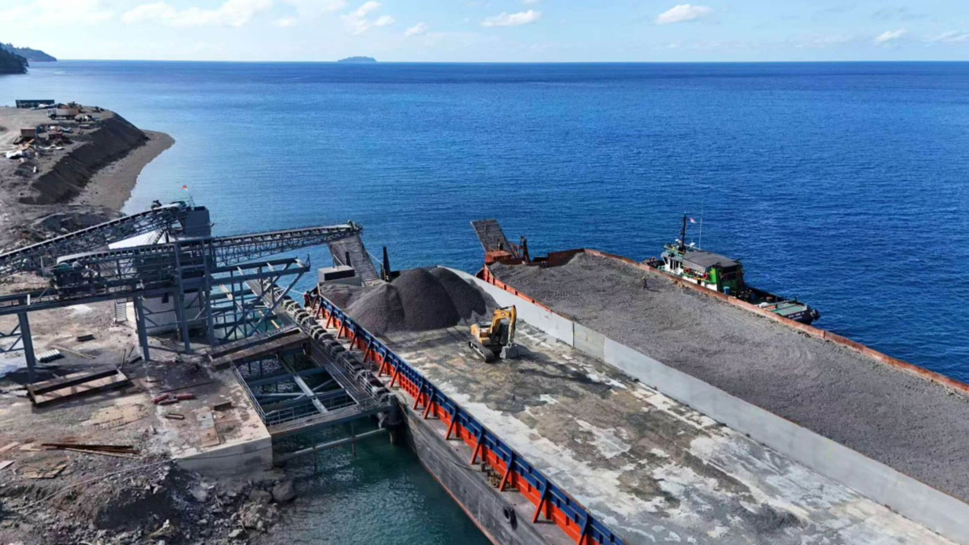 an abstract photo of a curved building with a blue sky in the background