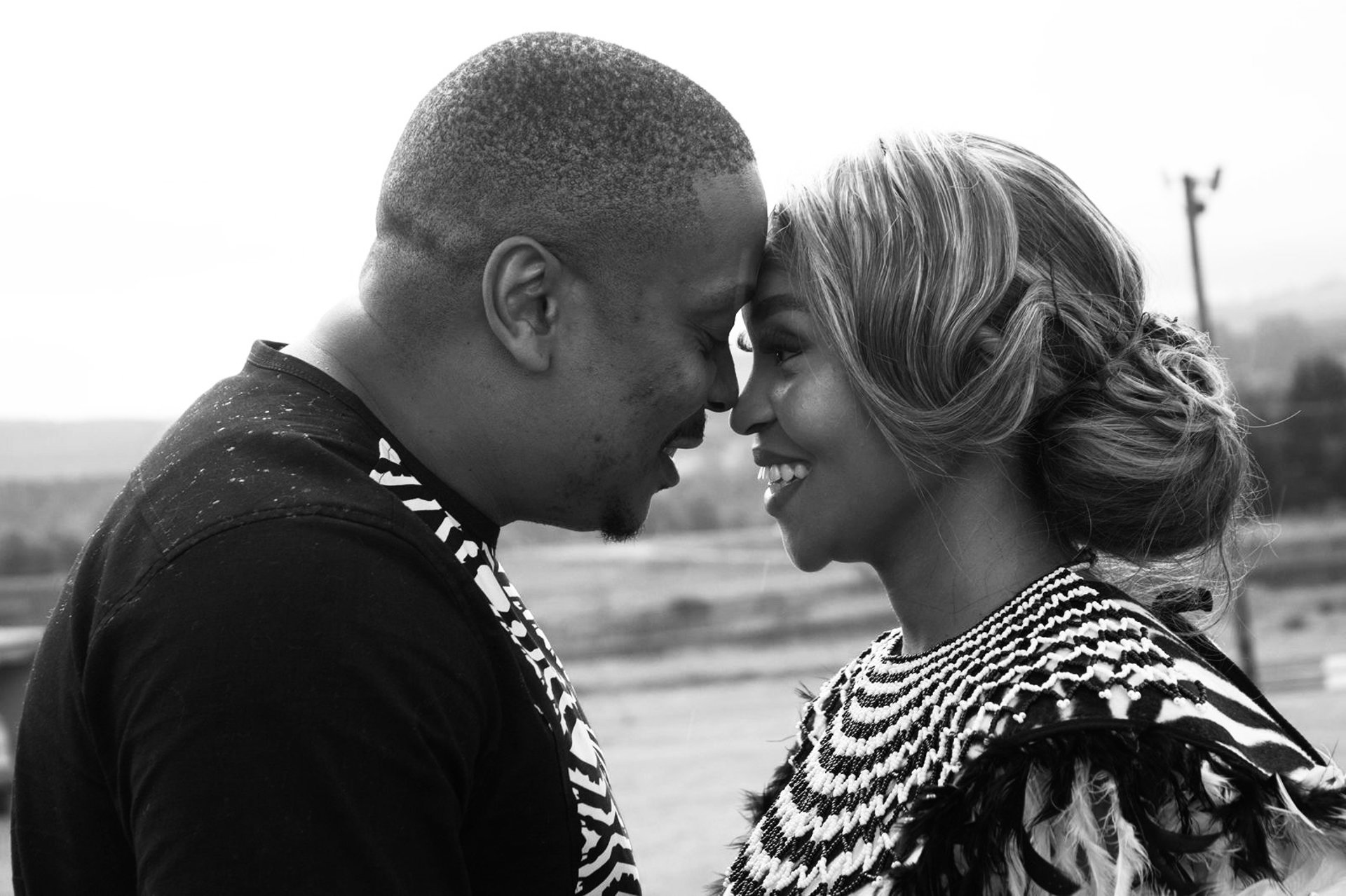 couple wearing silver-colored rings