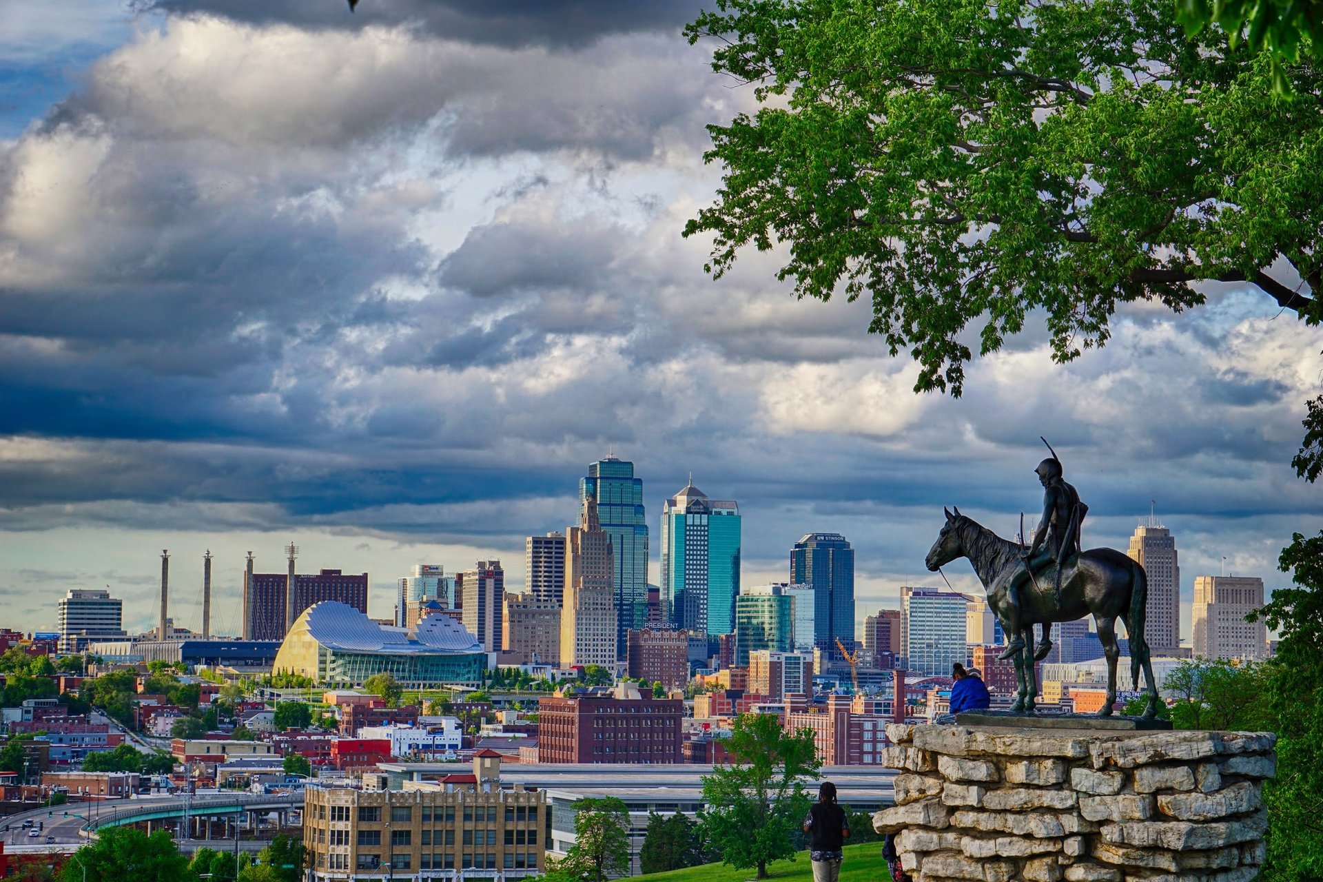 black and brown leather padded tub sofa