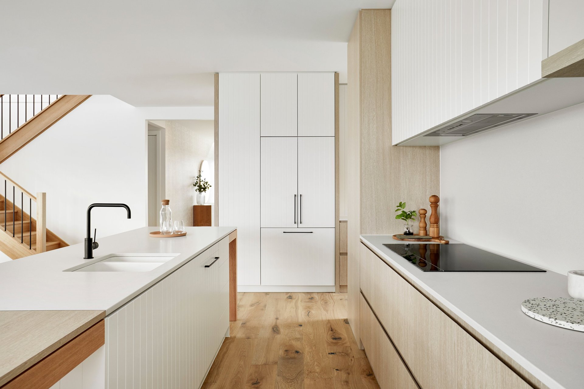 an abstract photo of a curved building with a blue sky in the background