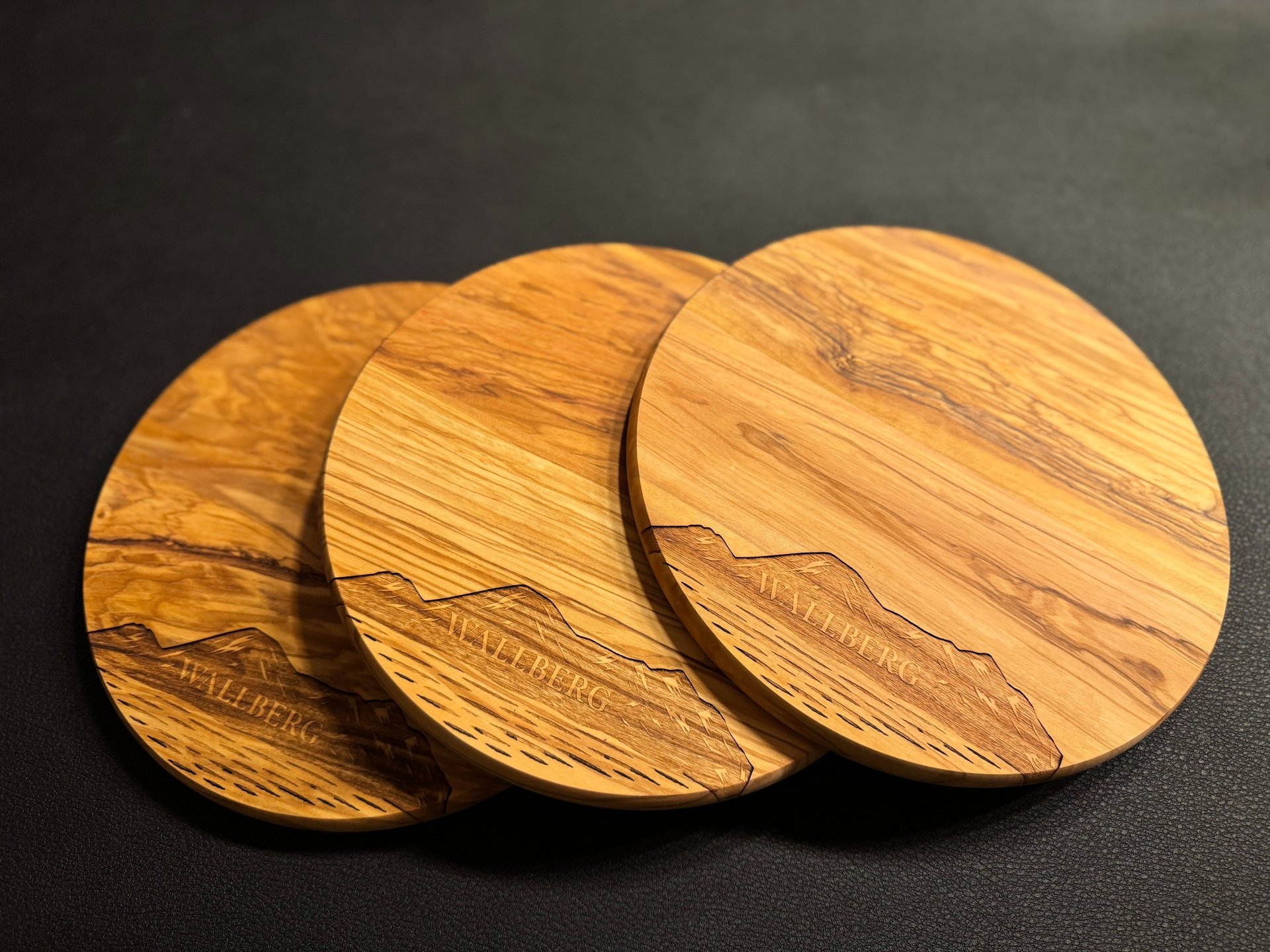 an abstract photo of a curved building with a blue sky in the background