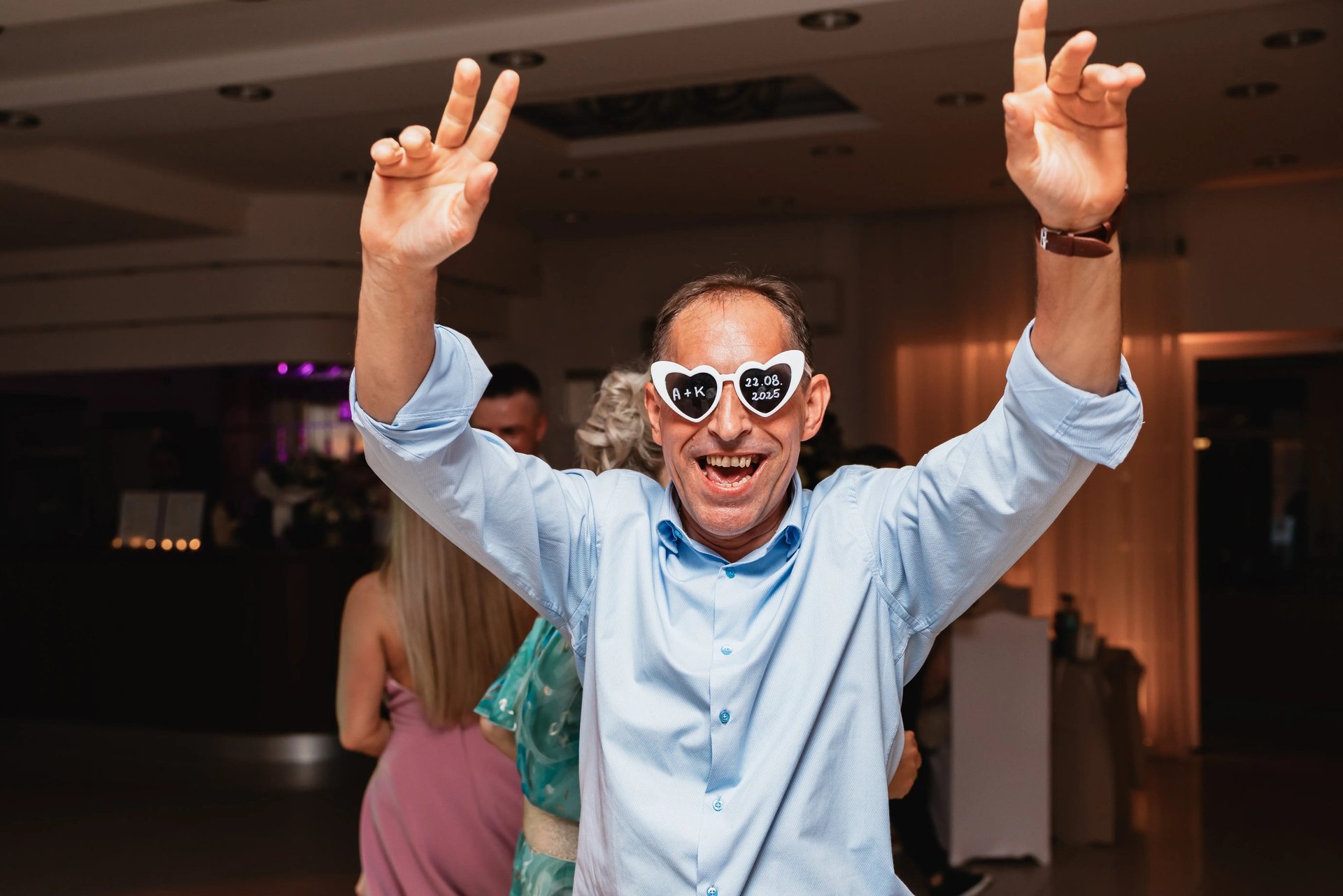 an abstract photo of a curved building with a blue sky in the background