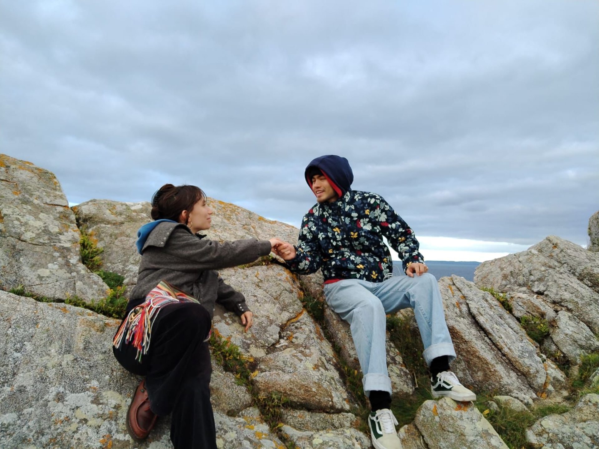 couple wearing silver-colored rings