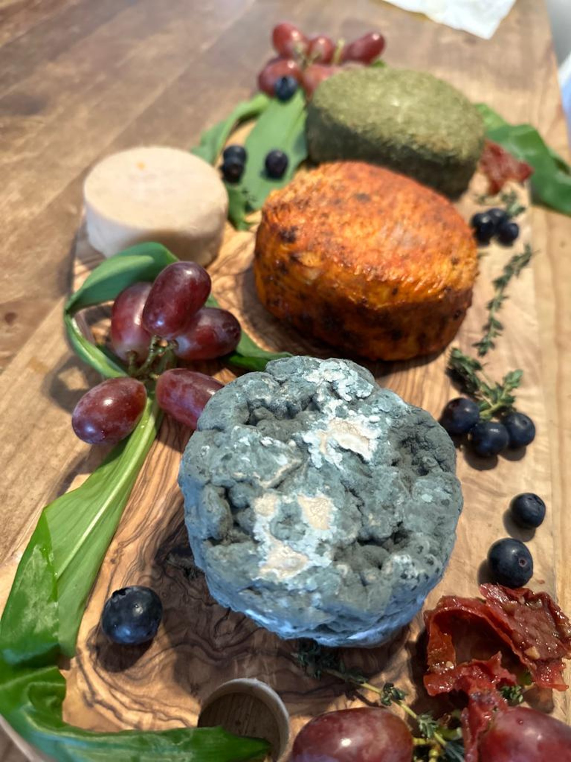 an abstract photo of a curved building with a blue sky in the background