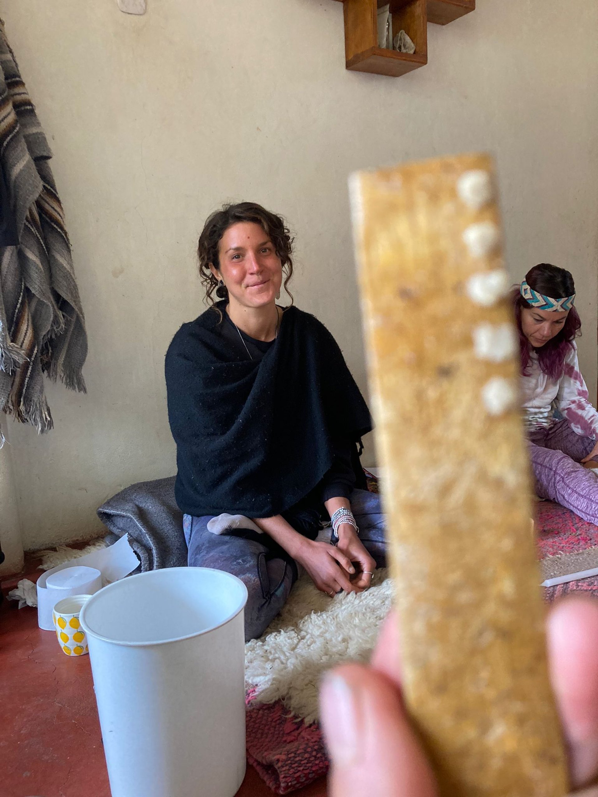 an abstract photo of a curved building with a blue sky in the background