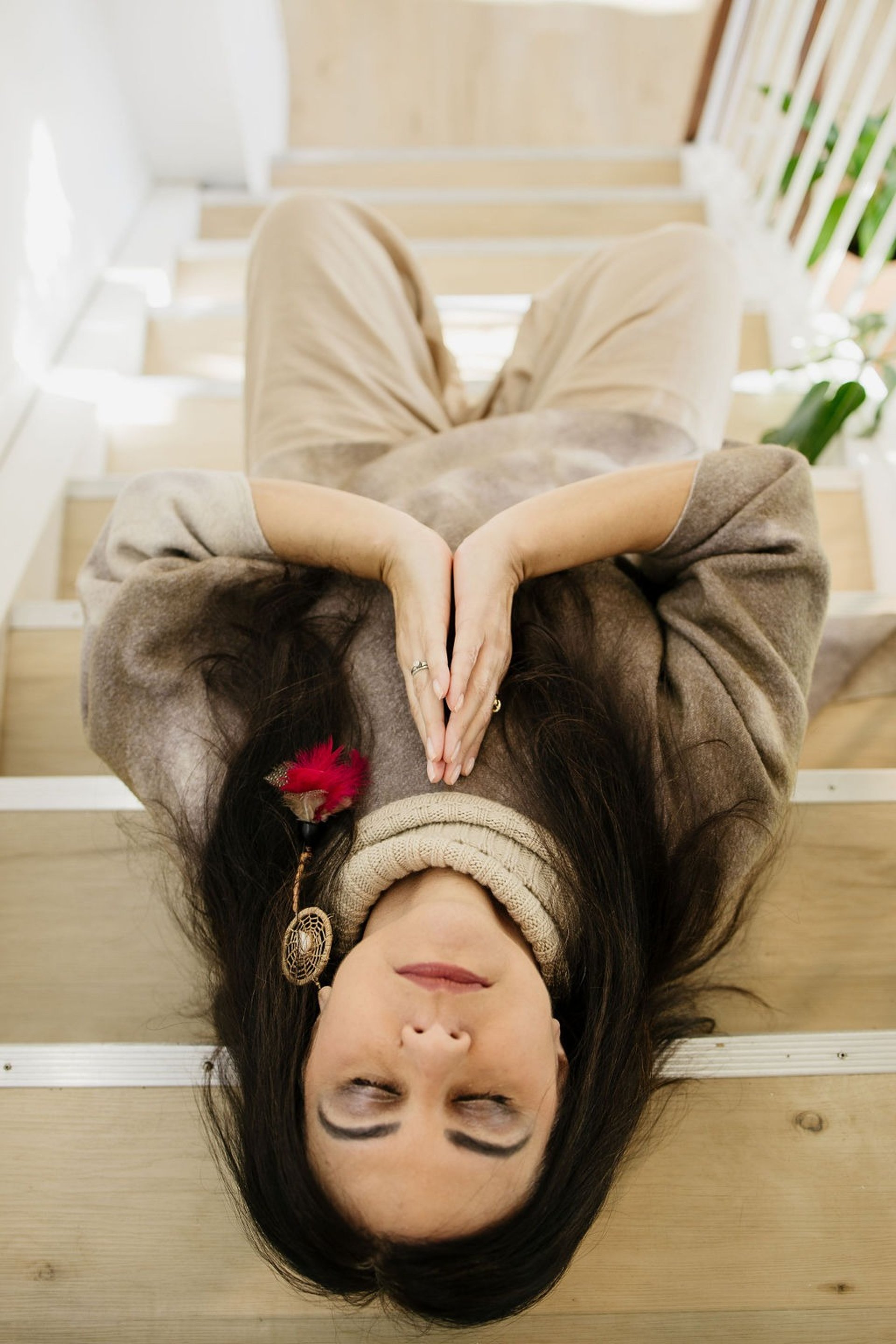 an abstract photo of a curved building with a blue sky in the background