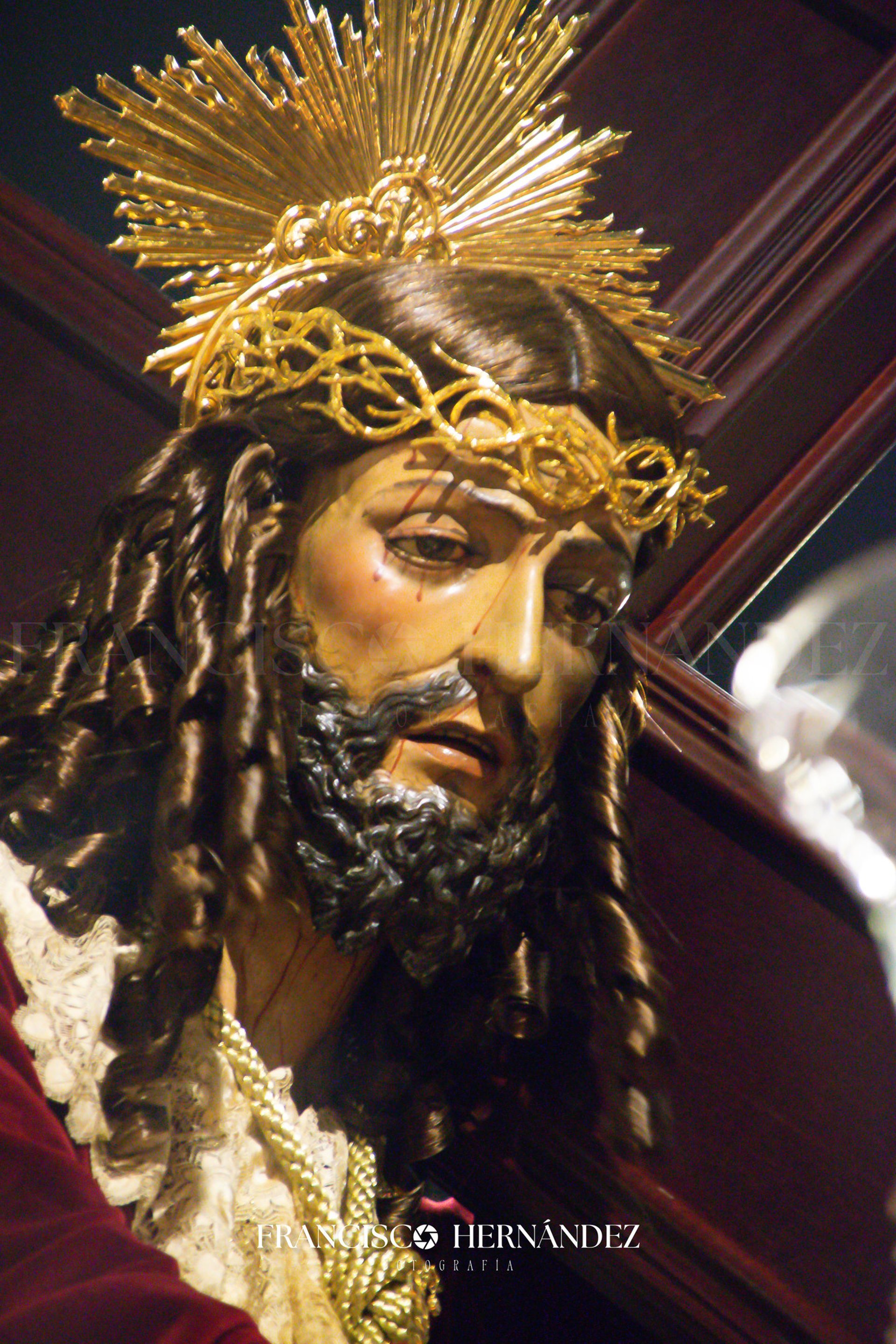 an abstract photo of a curved building with a blue sky in the background