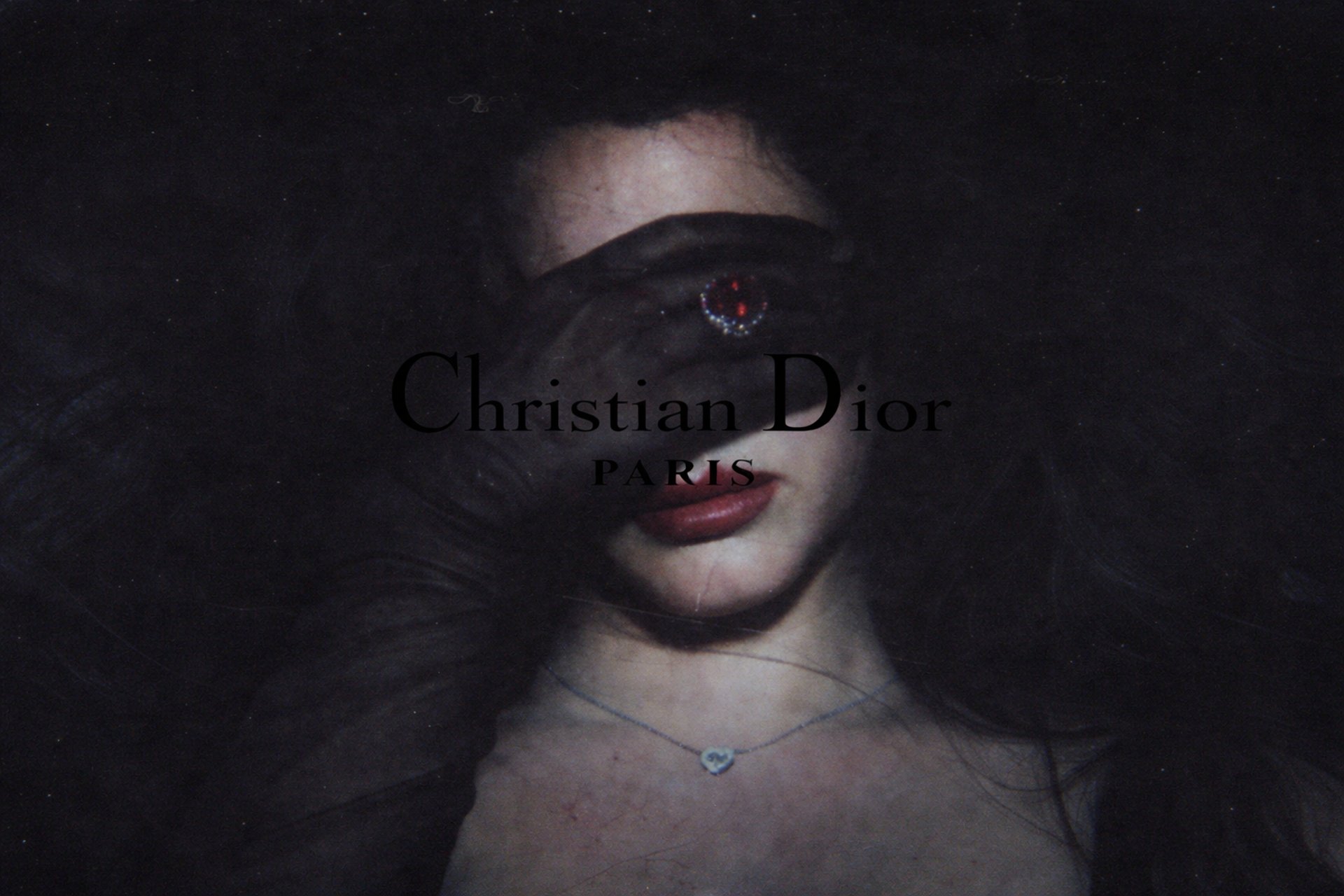 a close up of a pair of shoes with the word dior on it