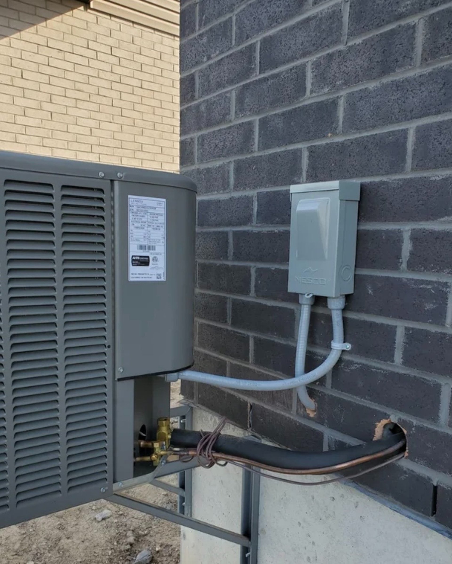 an abstract photo of a curved building with a blue sky in the background