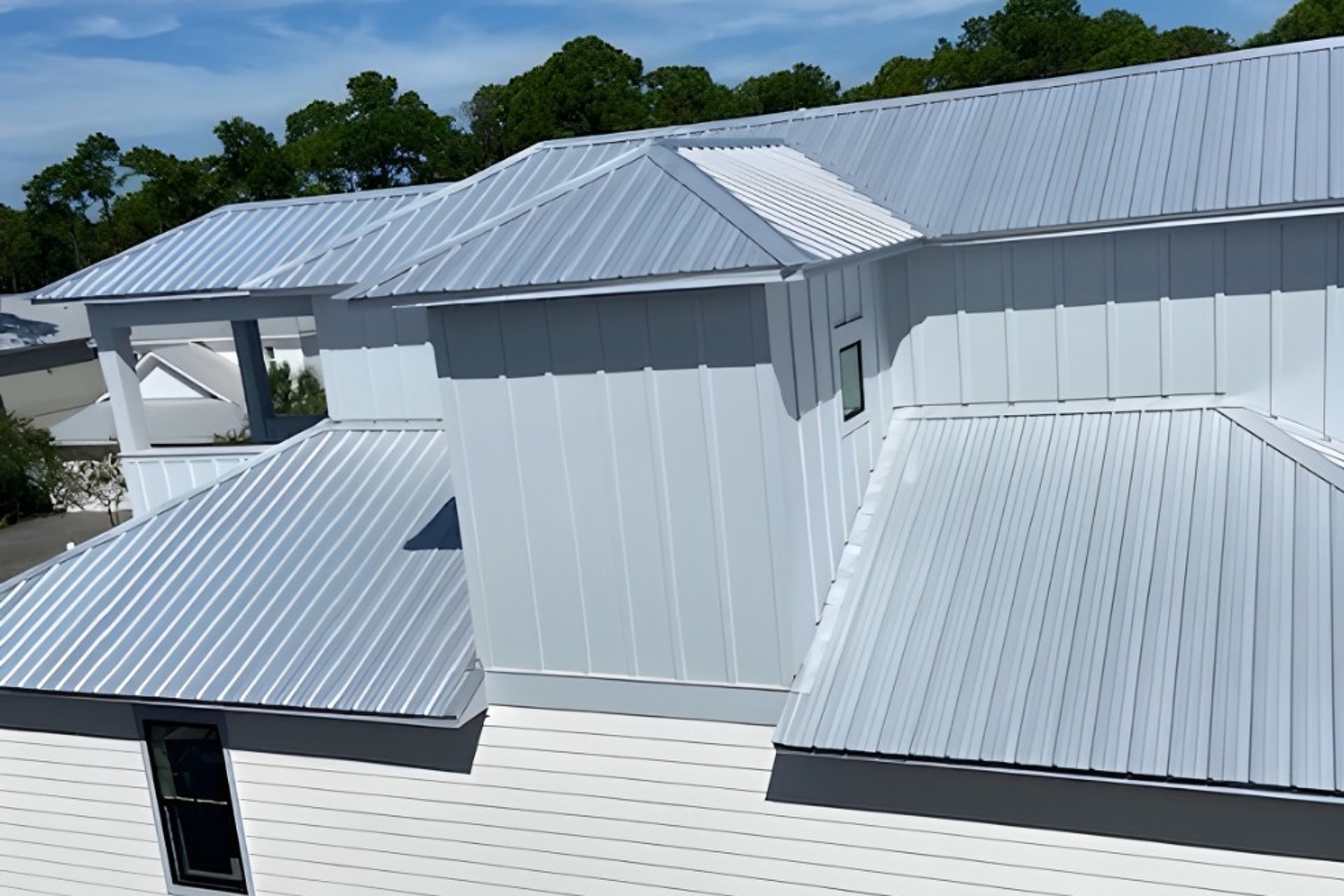 an abstract photo of a curved building with a blue sky in the background