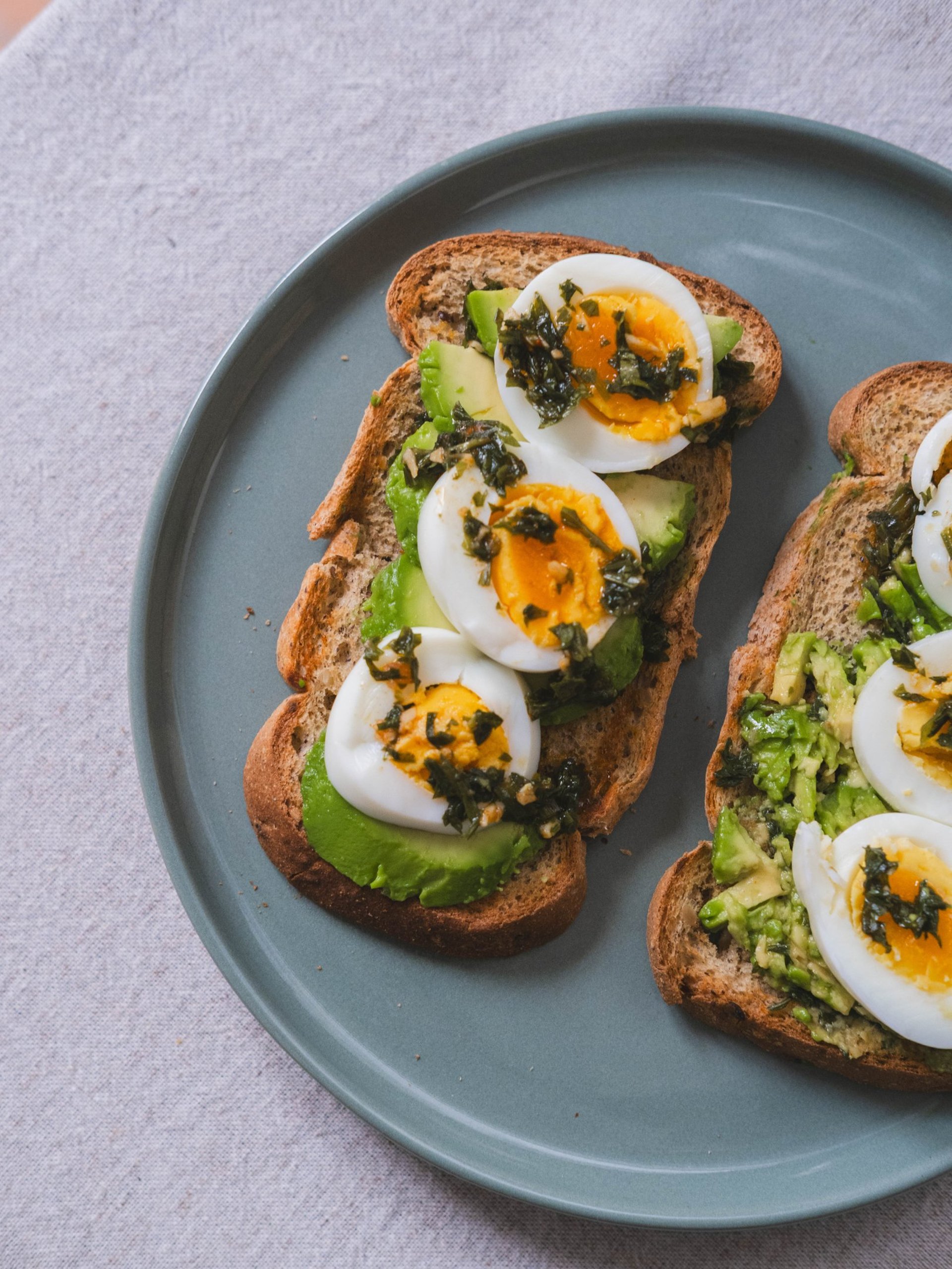 an abstract photo of a curved building with a blue sky in the background