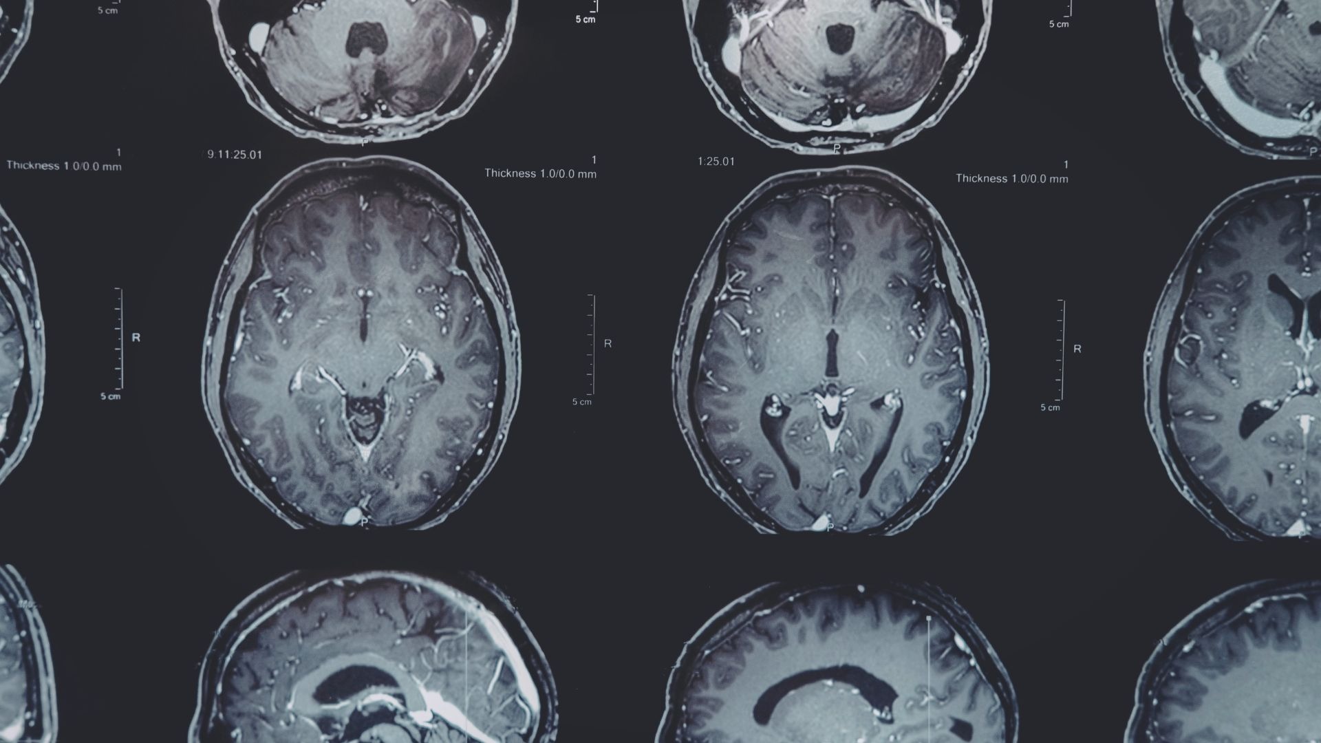 an abstract photo of a curved building with a blue sky in the background