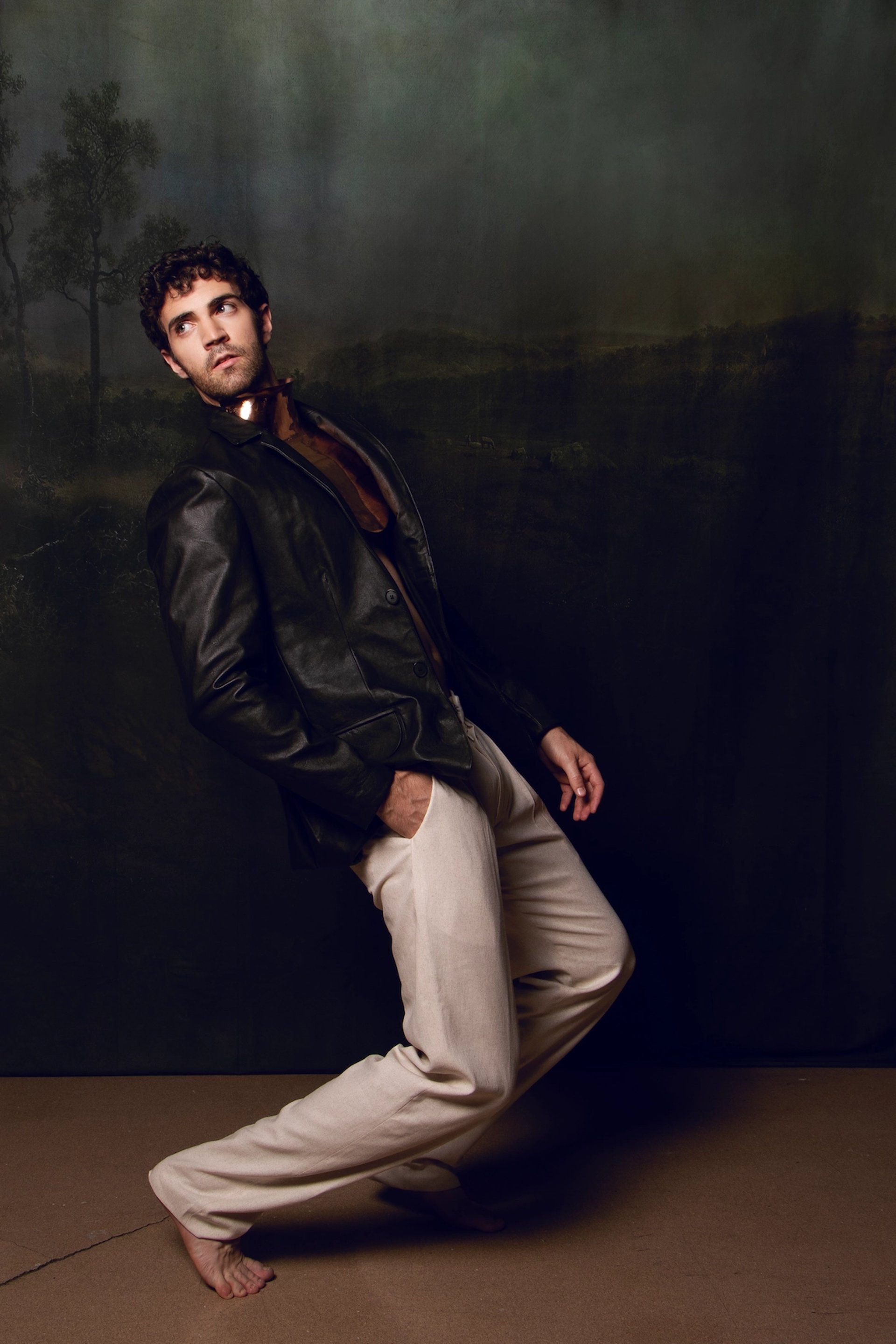 an abstract photo of a curved building with a blue sky in the background