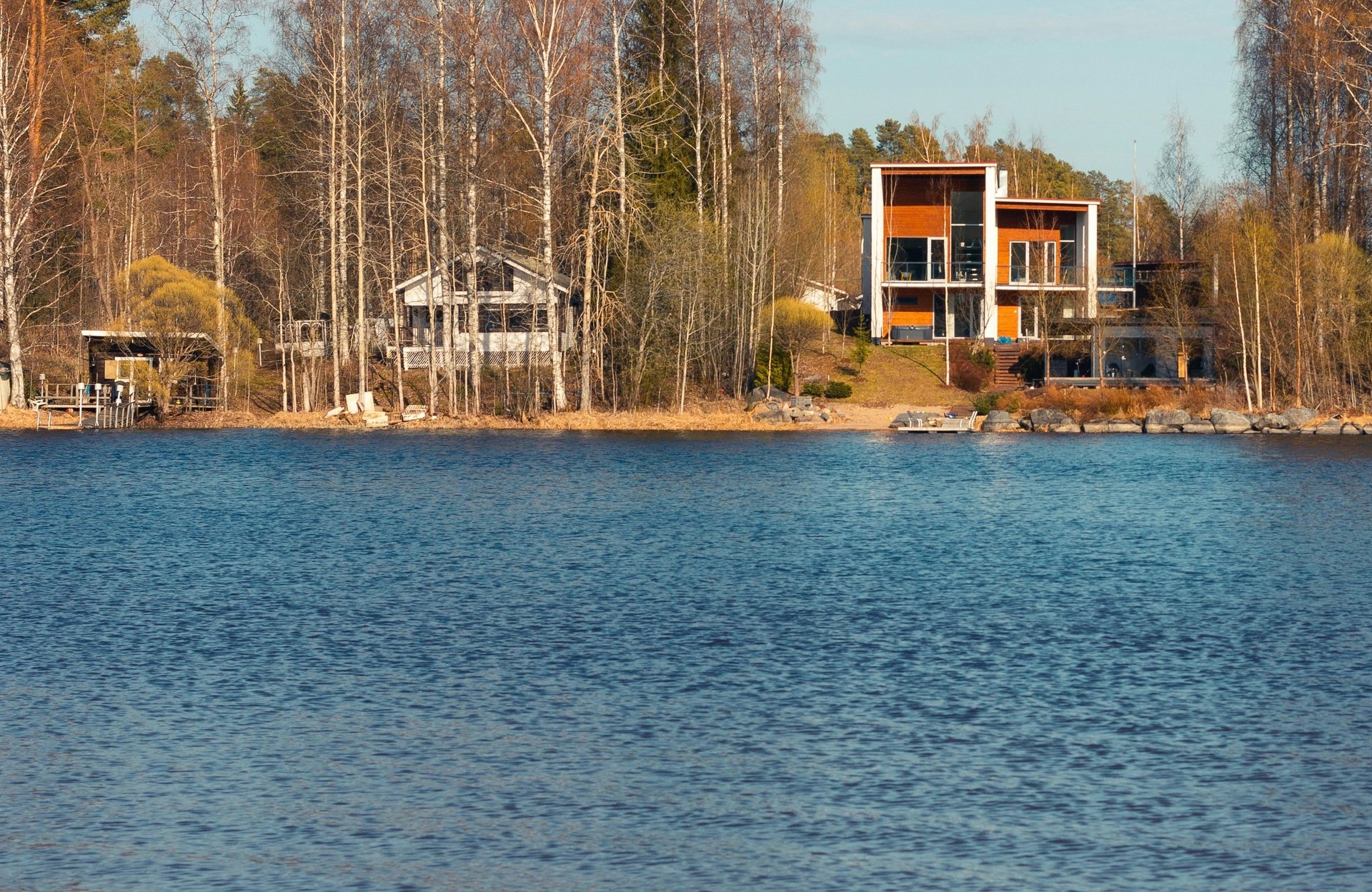 brown wooden dock on calm body ofwater