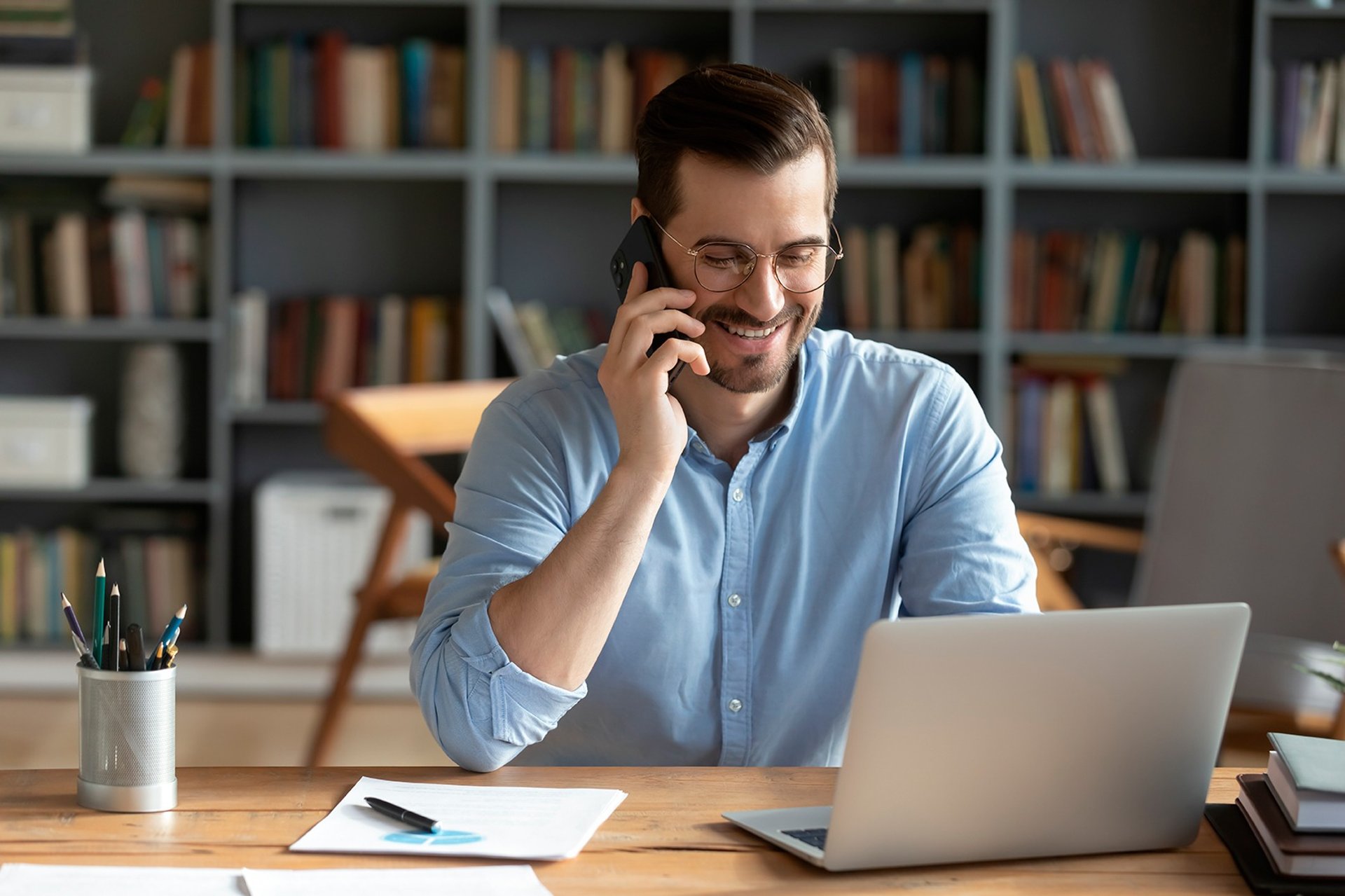 man in white dress shirt sitting beside woman in black long sleeve shirt