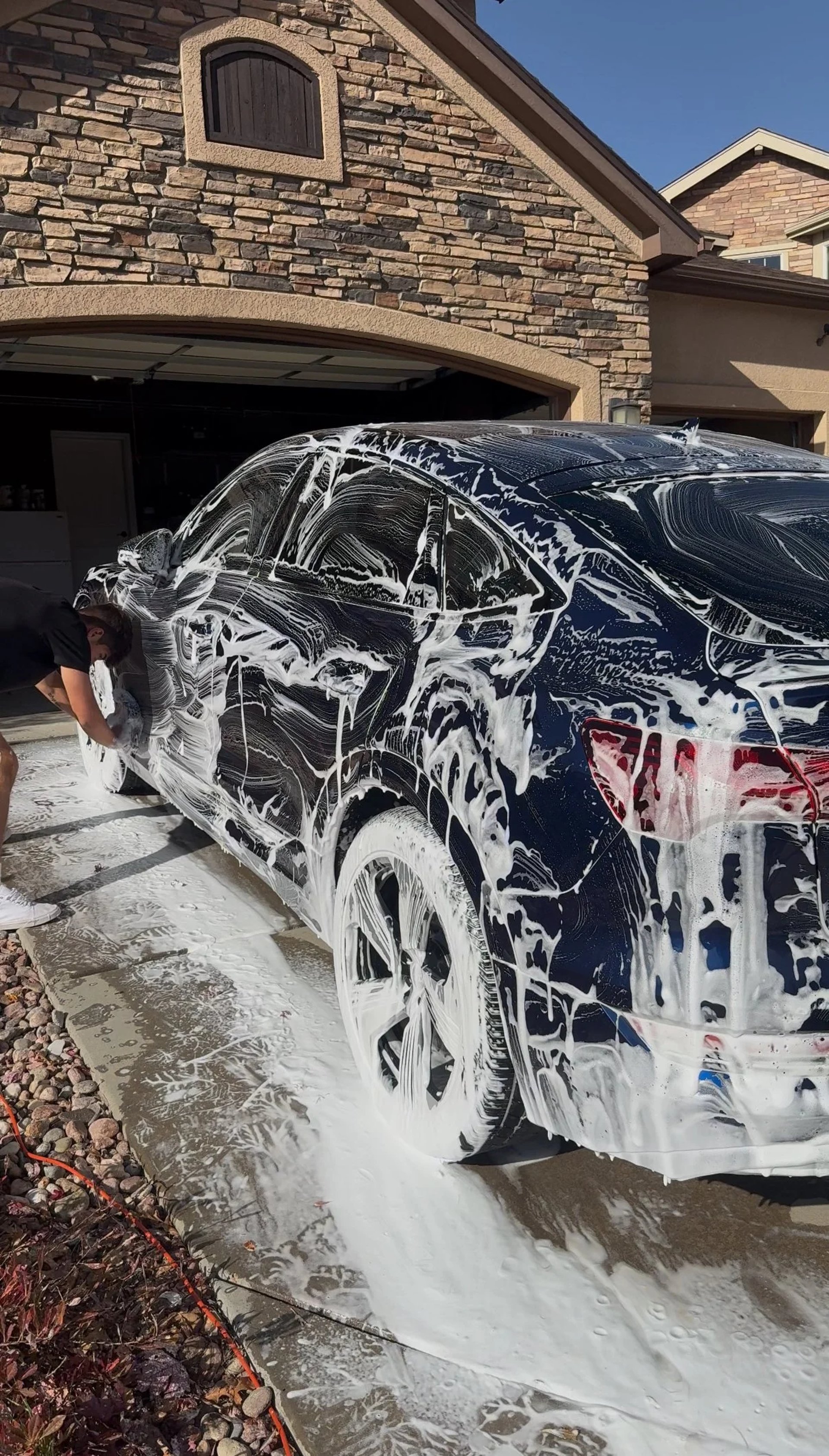 black and brown leather padded tub sofa