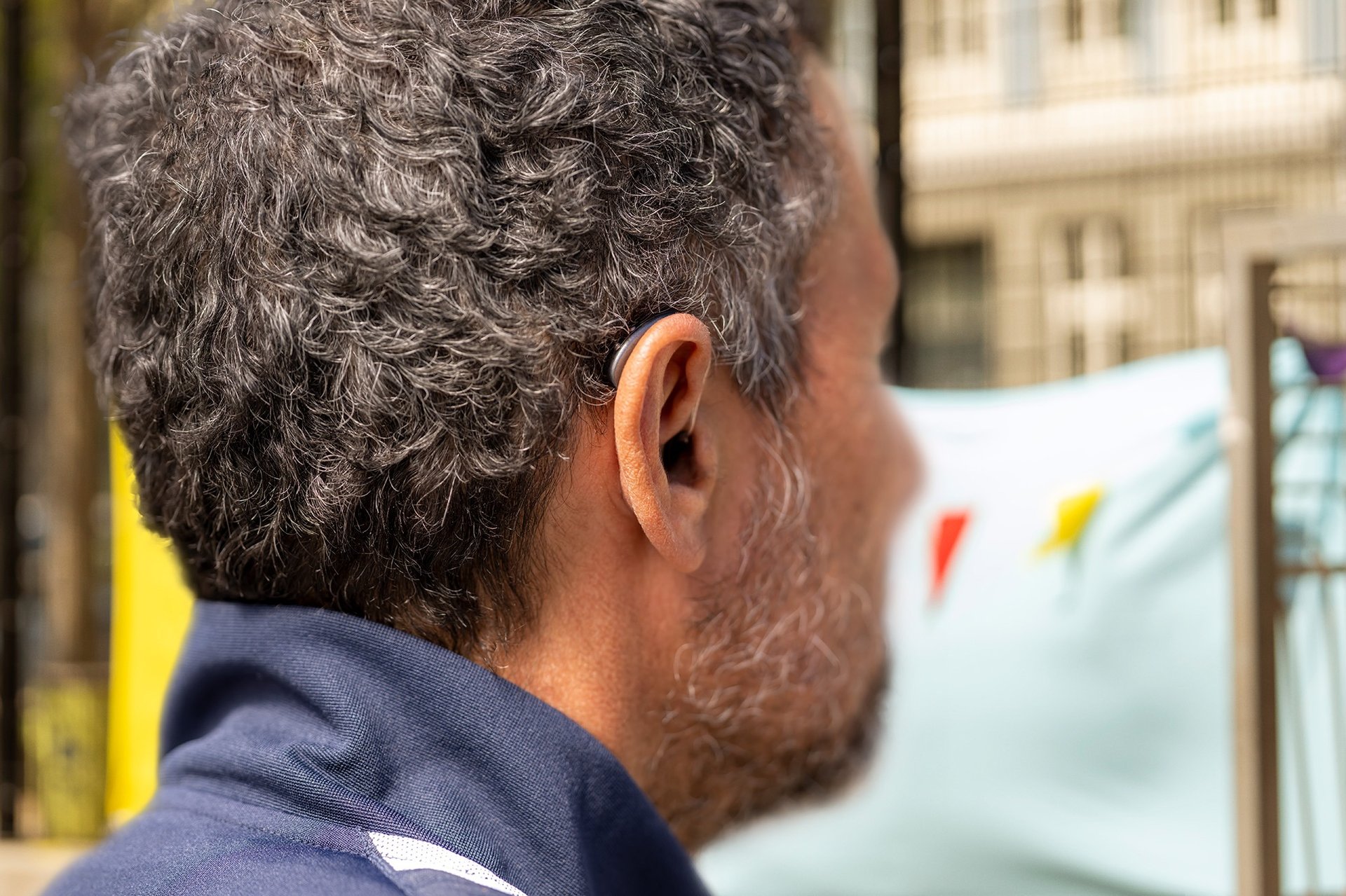 an abstract photo of a curved building with a blue sky in the background