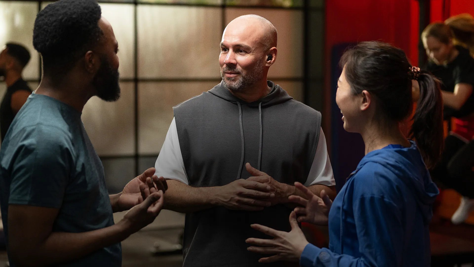 an abstract photo of a curved building with a blue sky in the background
