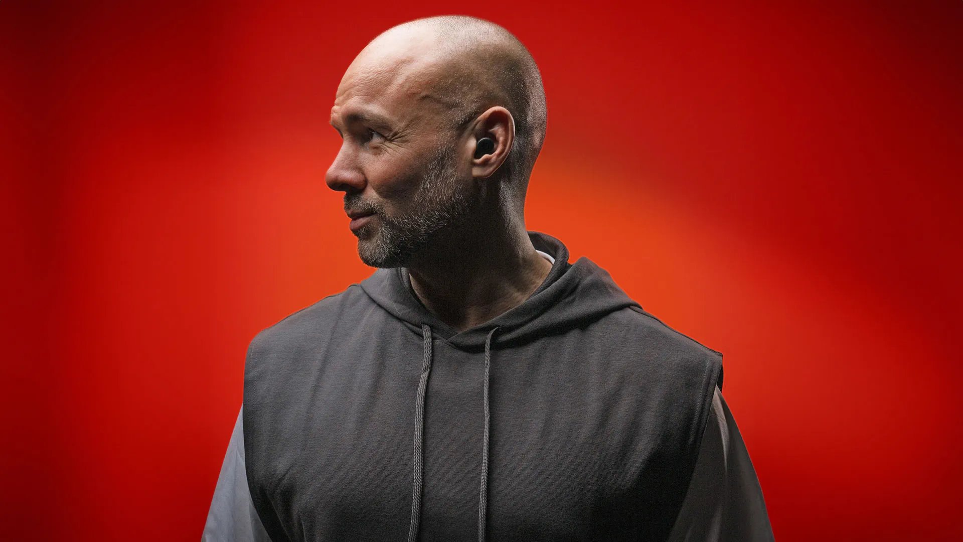 an abstract photo of a curved building with a blue sky in the background