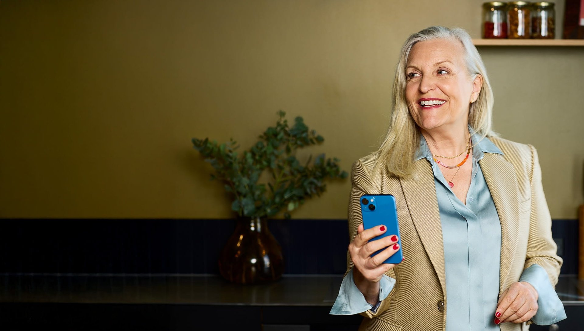 an abstract photo of a curved building with a blue sky in the background