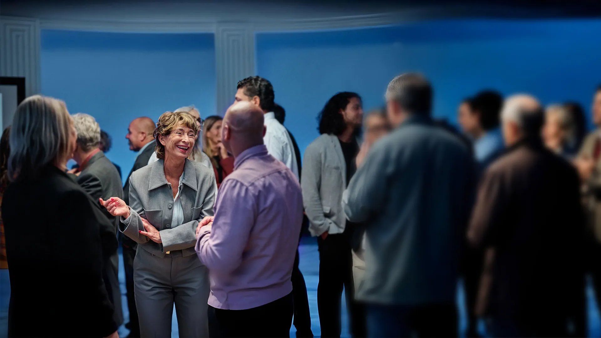 an abstract photo of a curved building with a blue sky in the background
