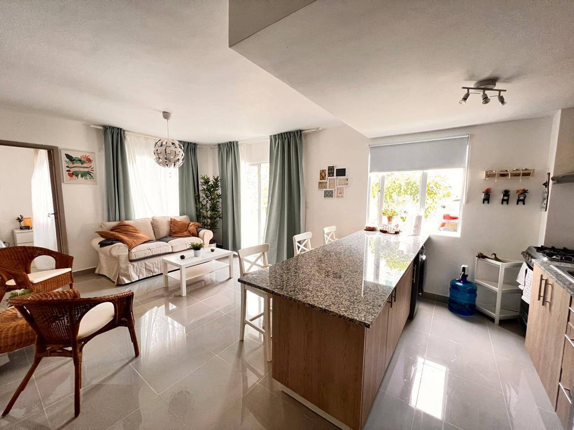 an abstract photo of a curved building with a blue sky in the background