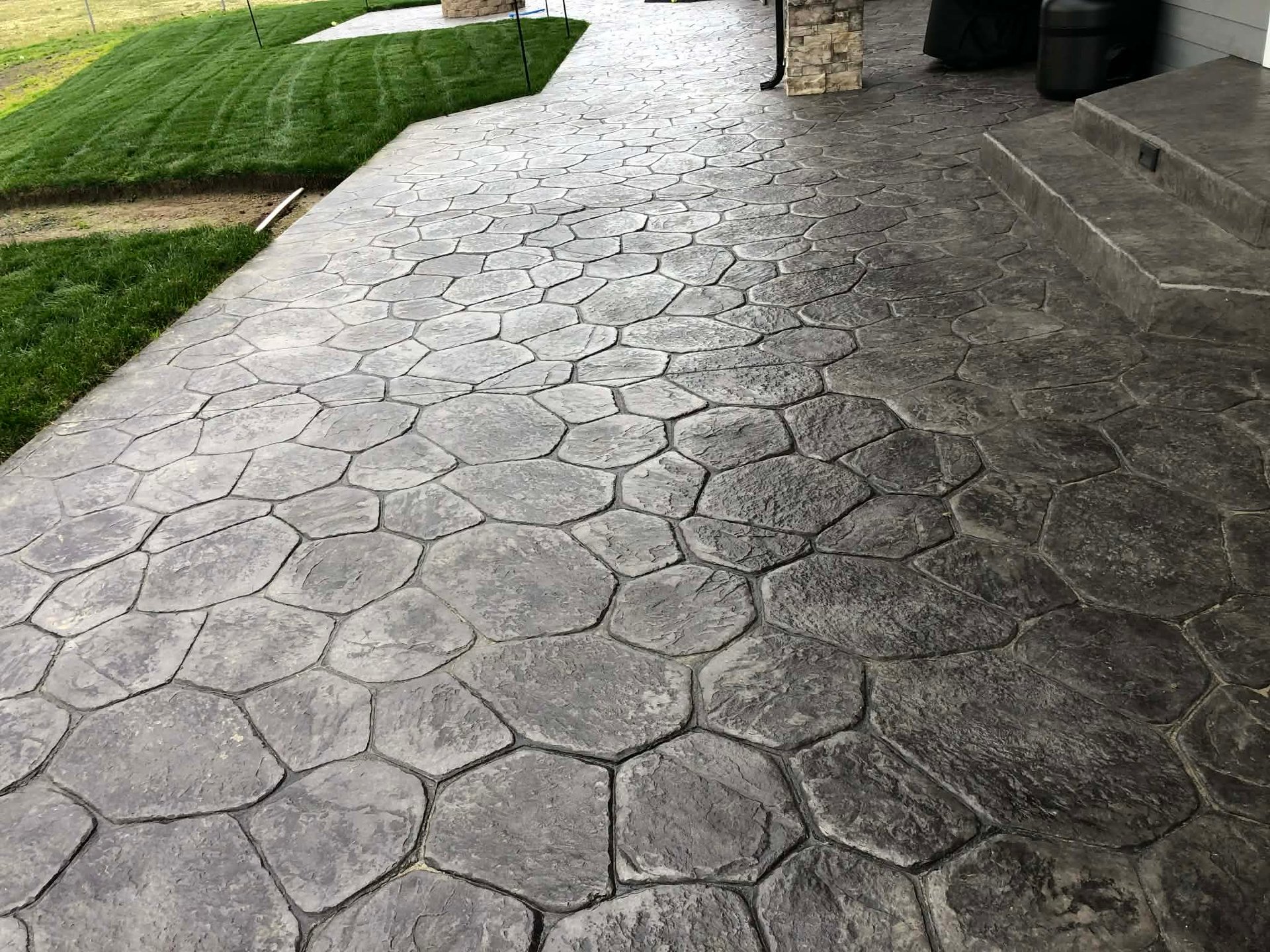 brown wooden framed blue padded armchair