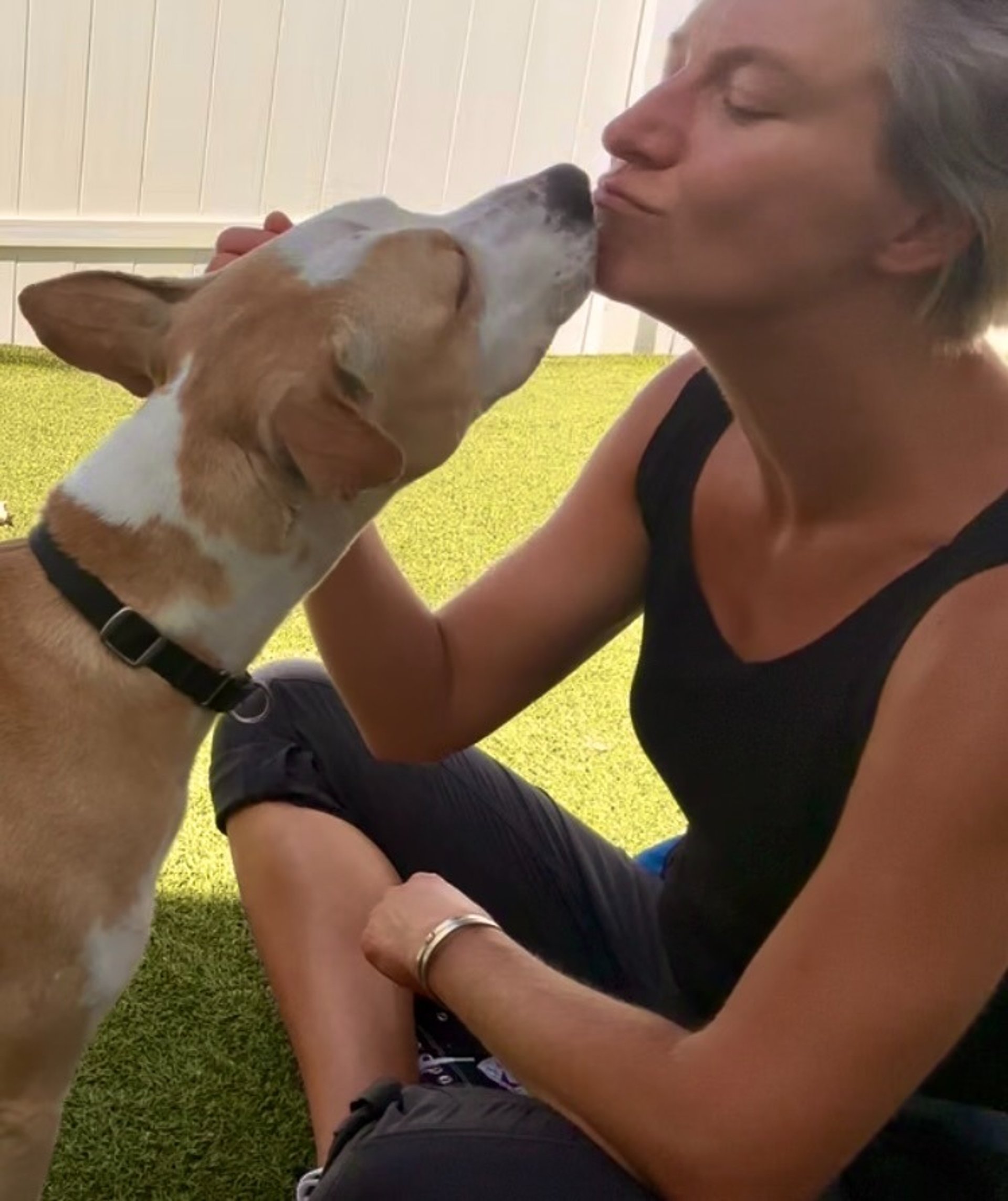 an abstract photo of a curved building with a blue sky in the background