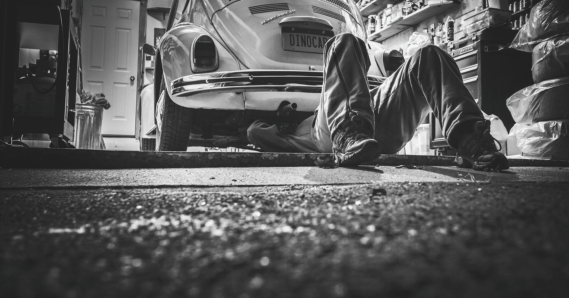 black and brown leather padded tub sofa