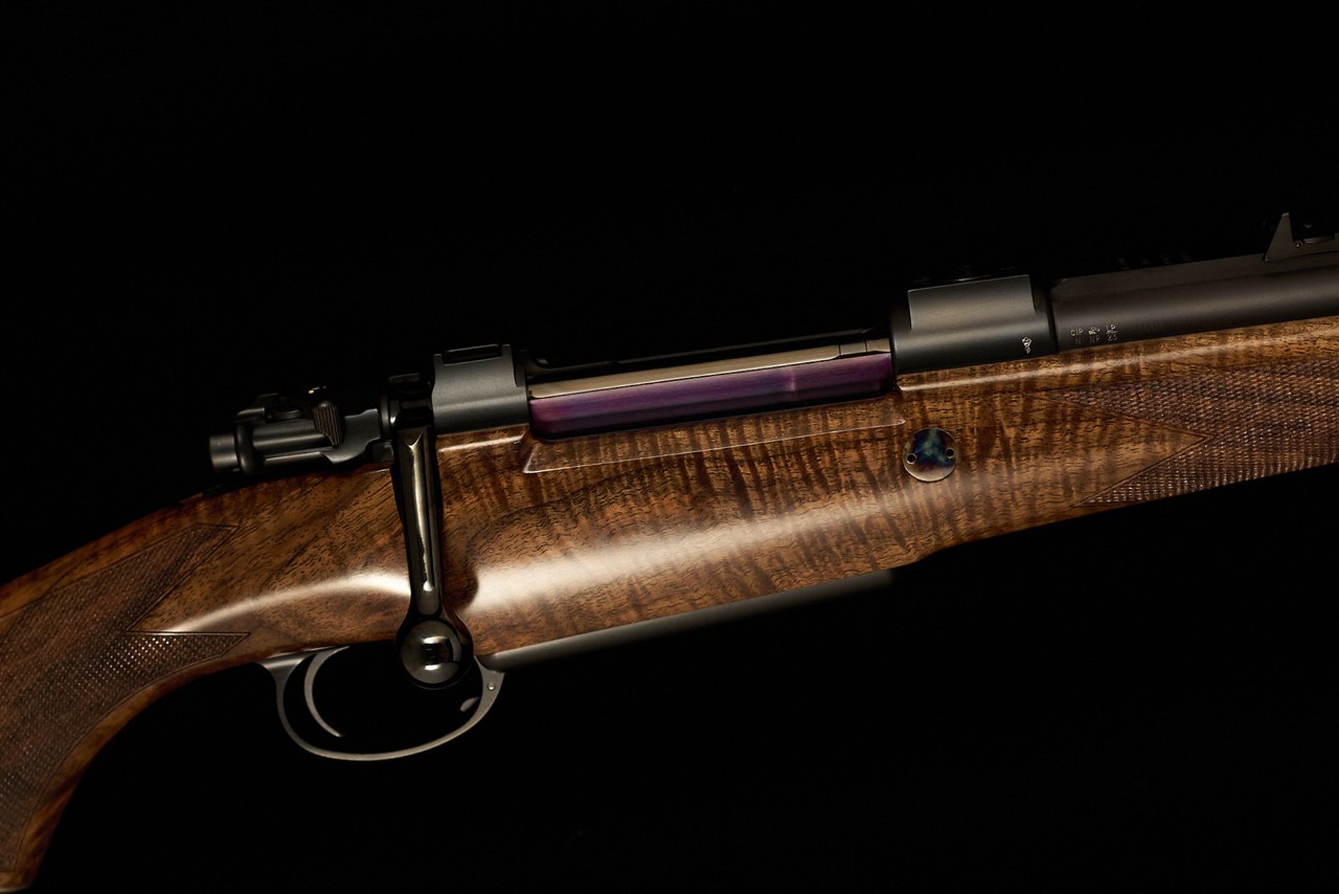 black semi automatic pistol with white smoke