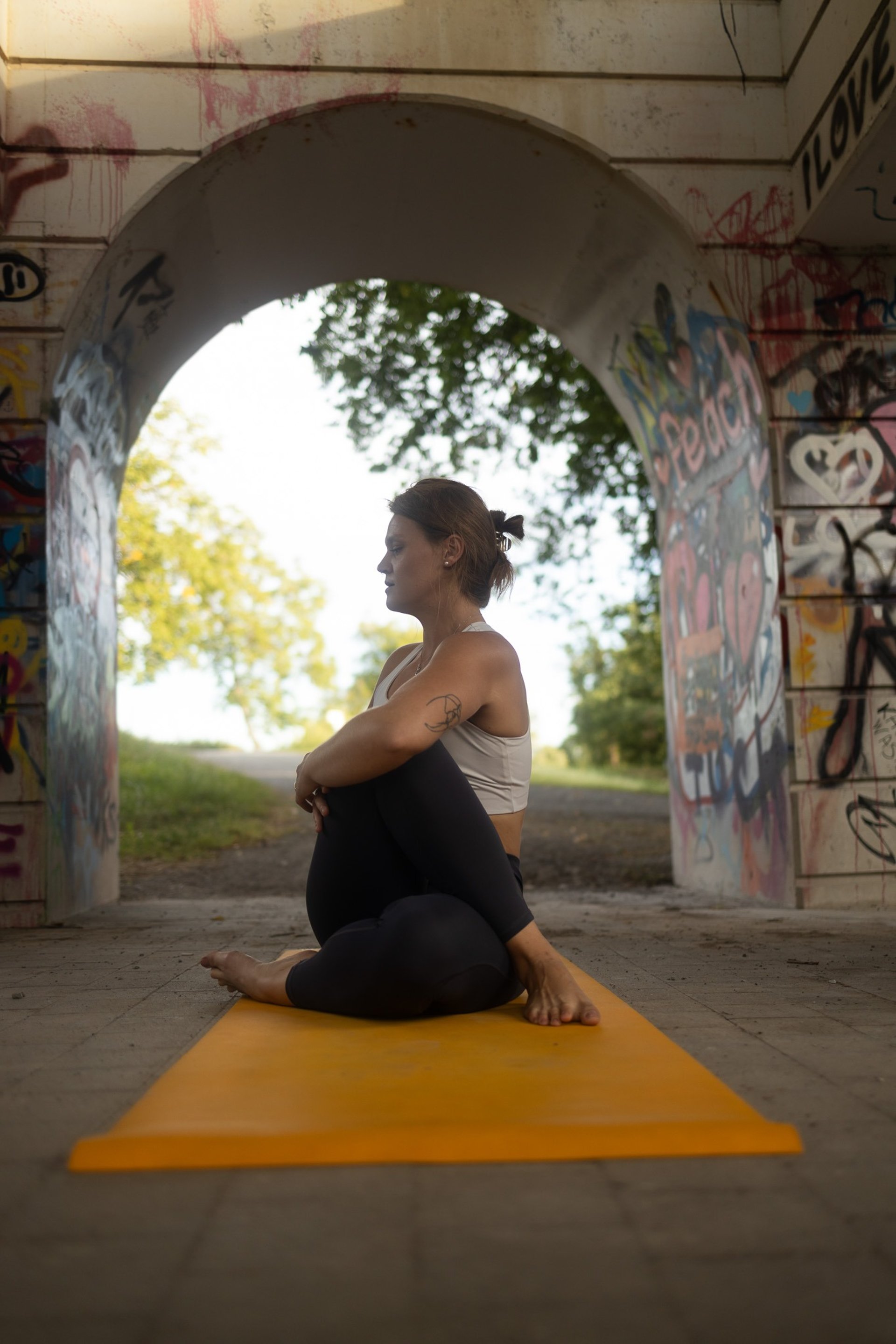 an abstract photo of a curved building with a blue sky in the background