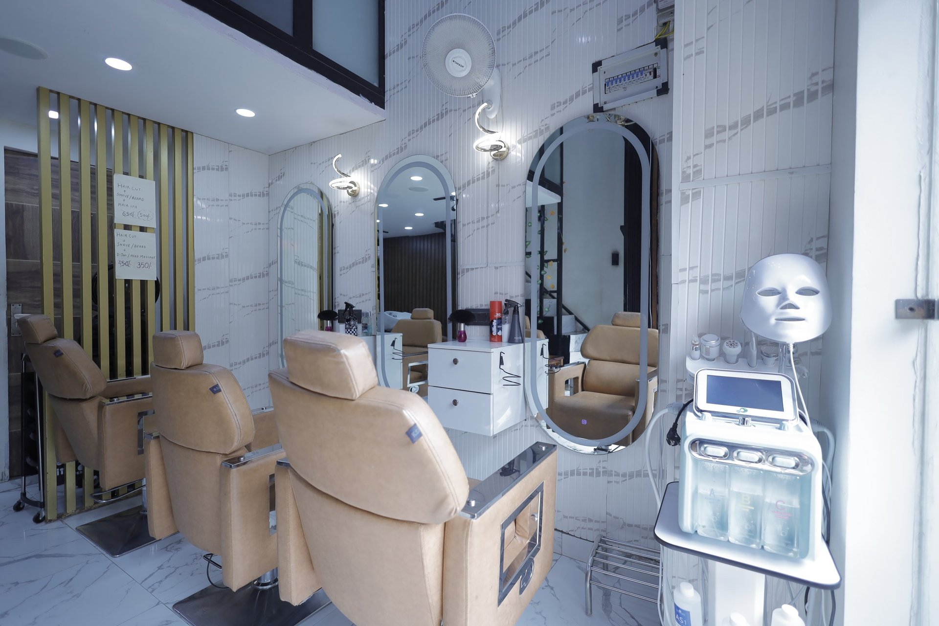 woman in gray sweater sitting on brown wooden chair