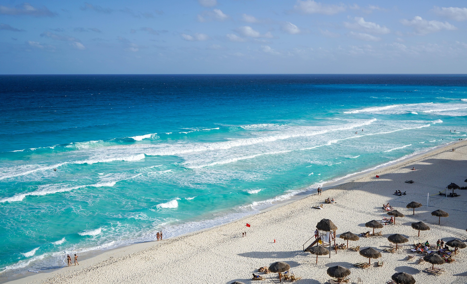 aerial view of people on beach during daytime