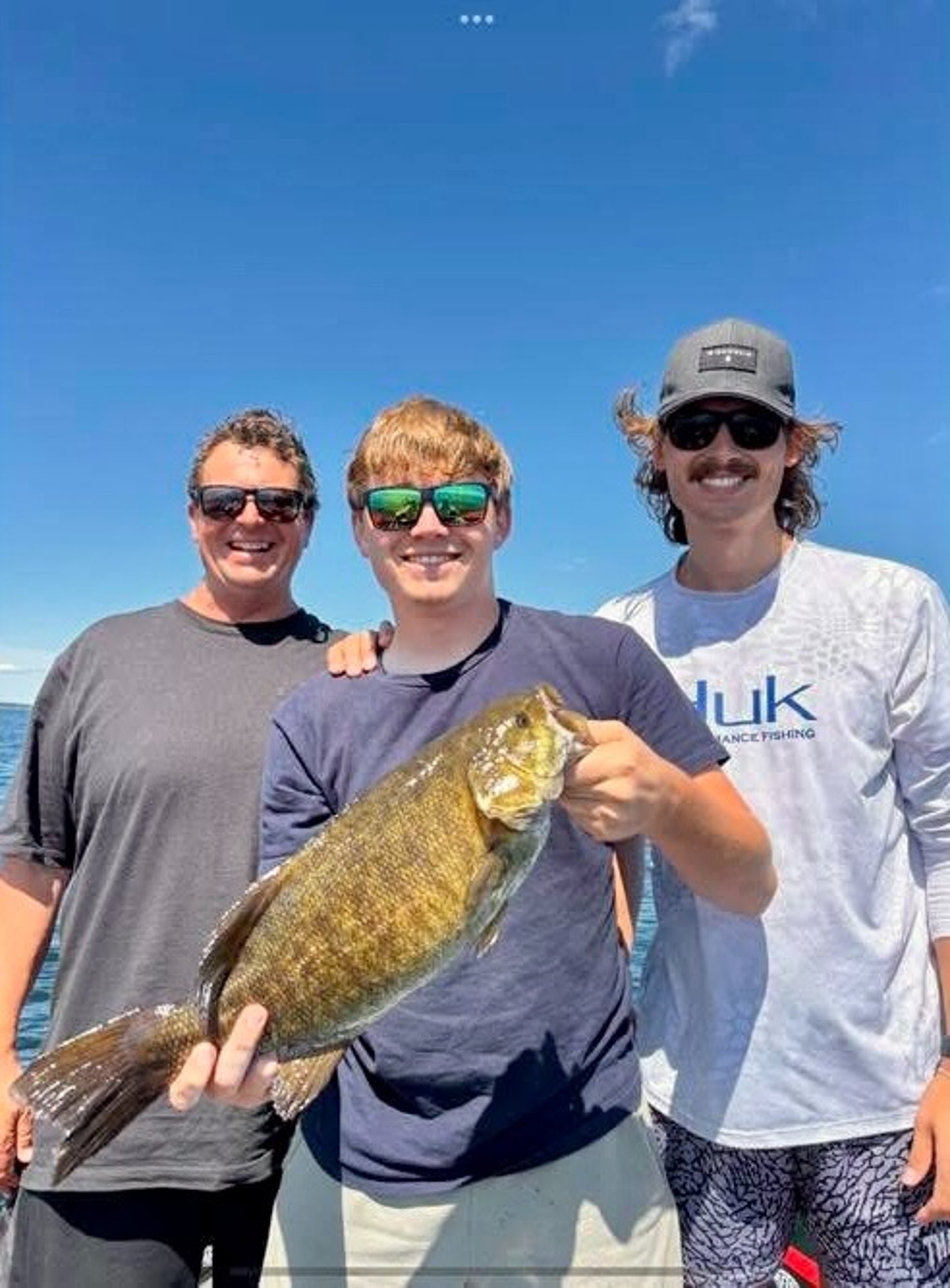 woman wearing yellow long-sleeved dress under white clouds and blue sky during daytime