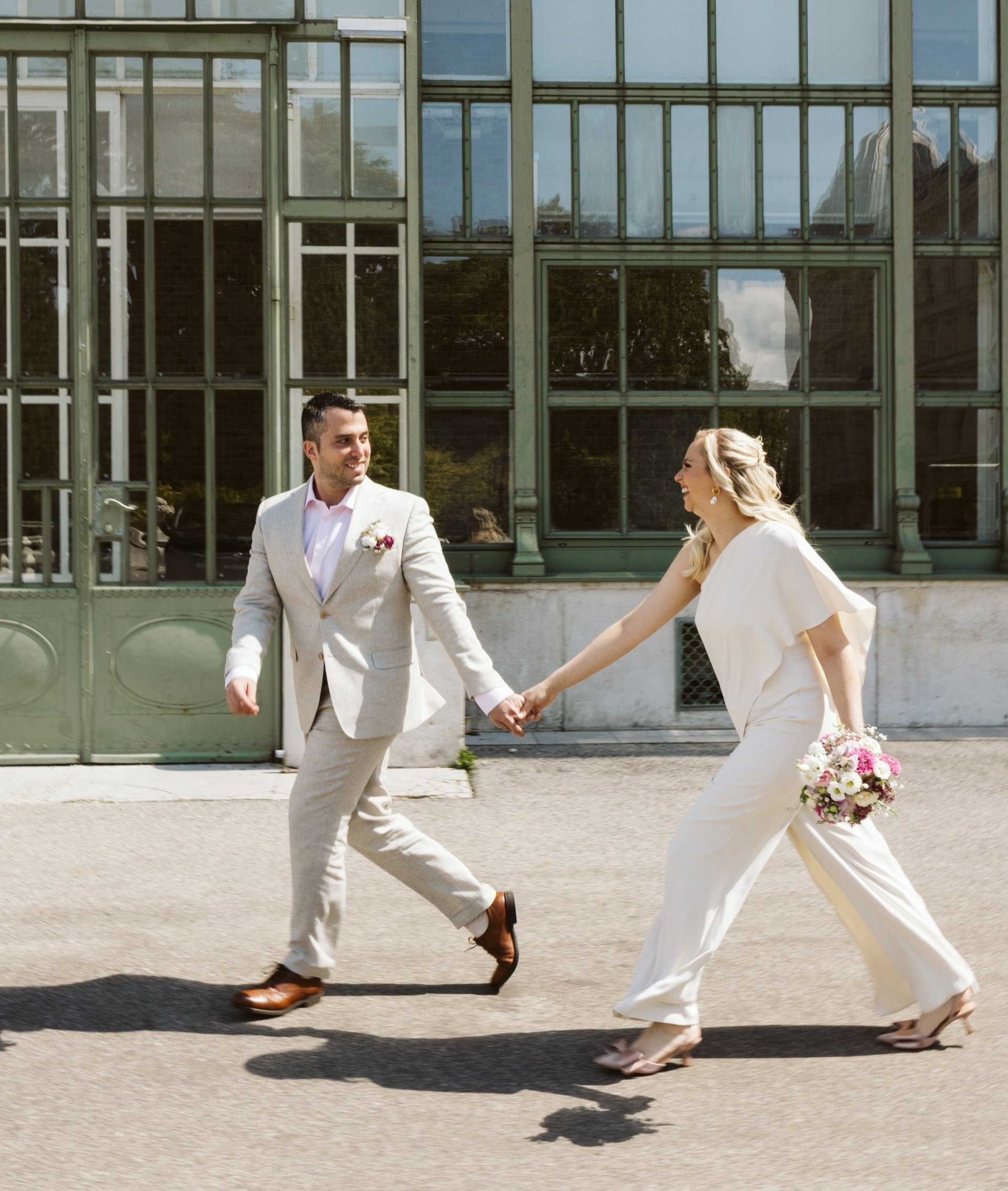 couple wearing silver-colored rings